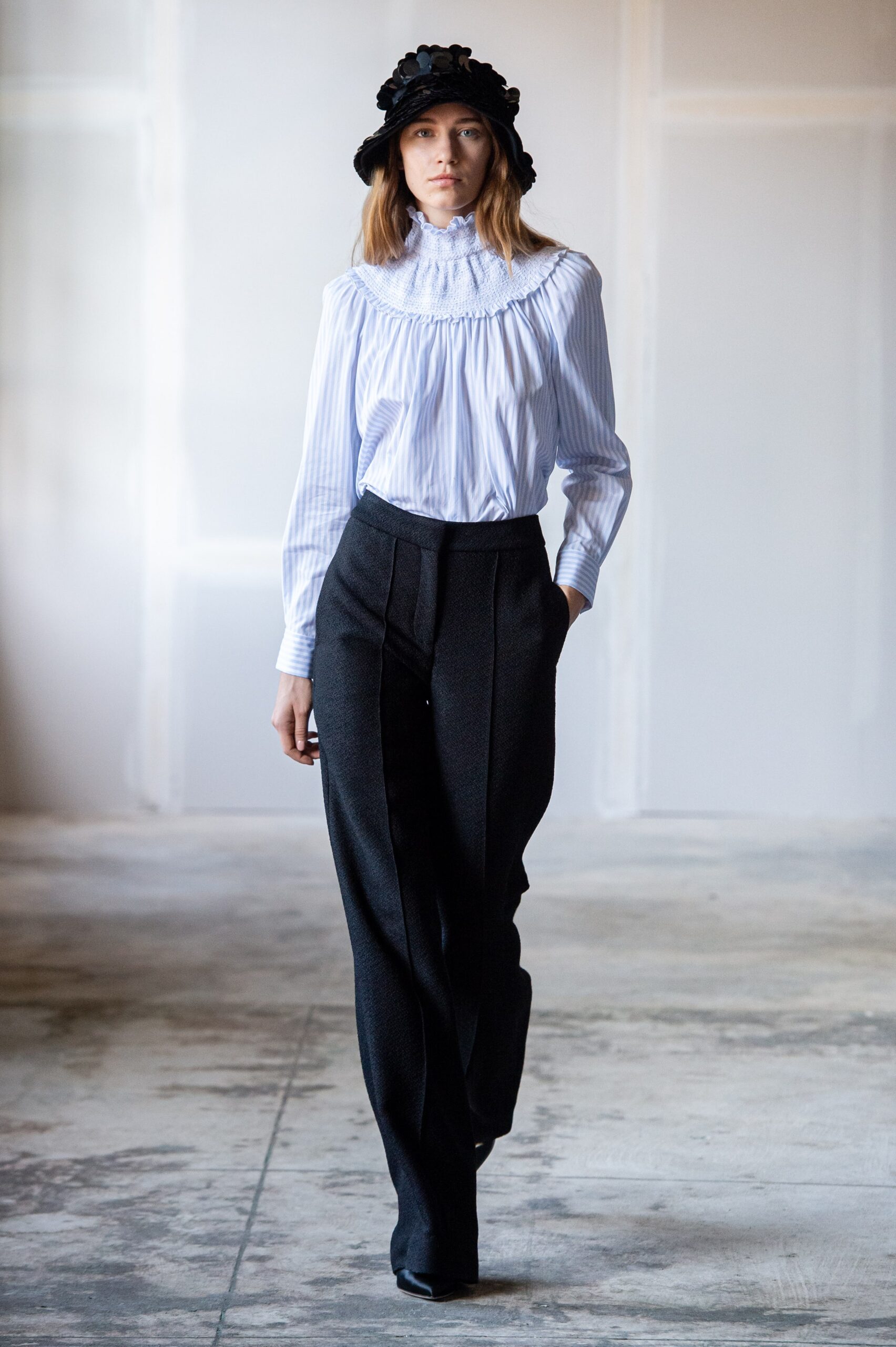white blue striped blouse black tailored pants