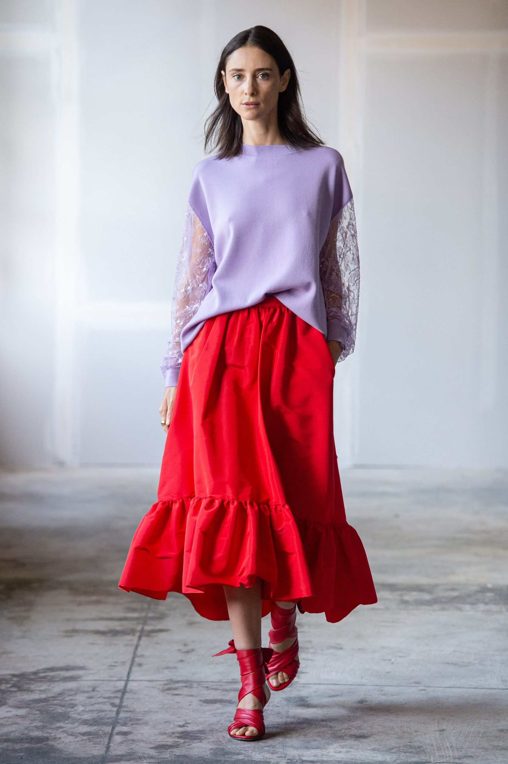 purple relaxed top with red skirt