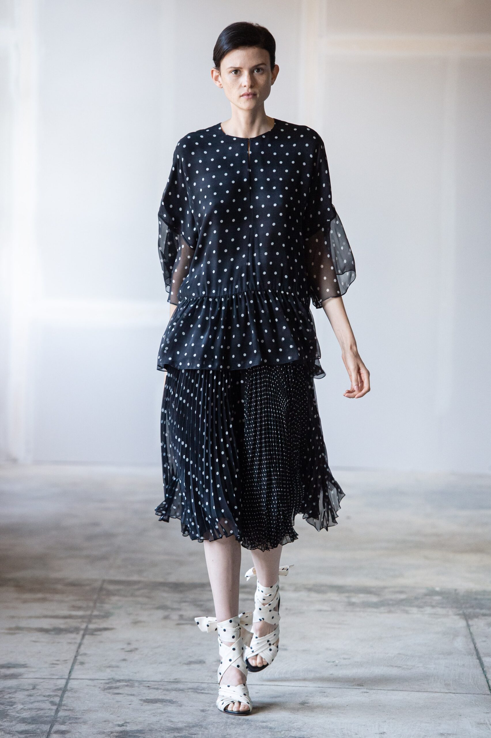 black and white polka-dot outfit