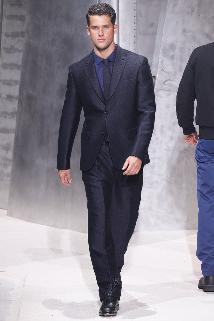 navy tailored suit with blue shirt