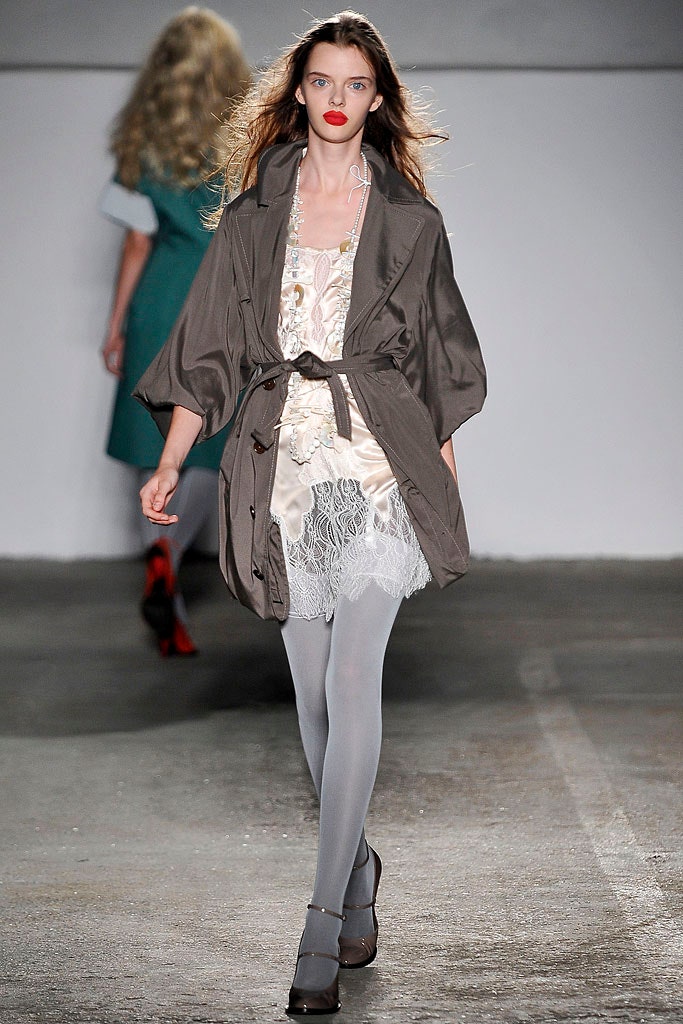 gray coat over white mini dress