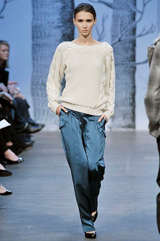 white knit sweater and blue silk pants