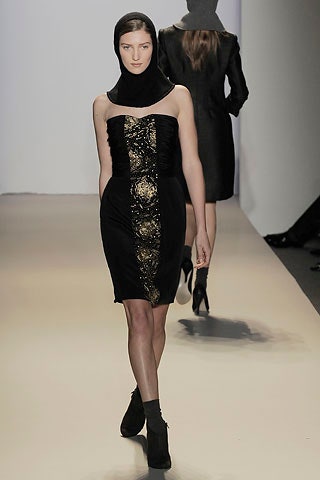 black fitted mini dress and coat