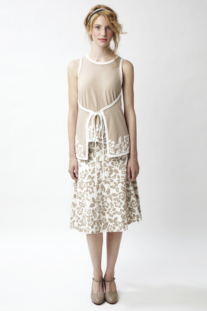 beige embroidered top and flared skirt