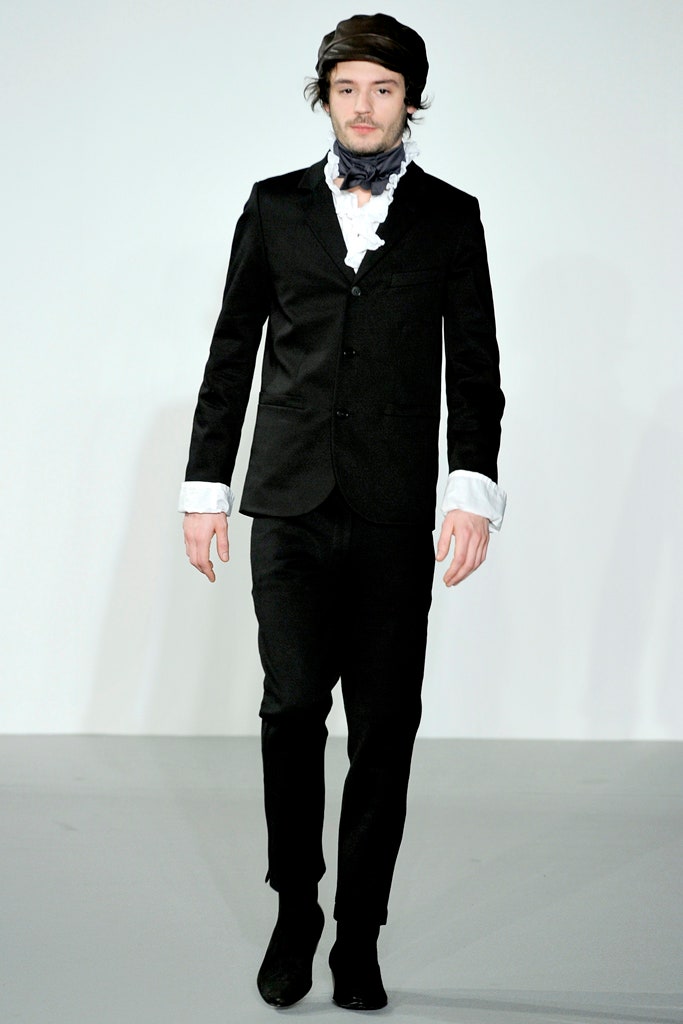 black tailored suit with white shirt