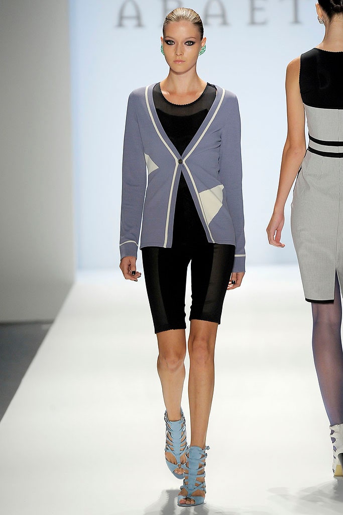gray fitted jacket with black bodysuit
