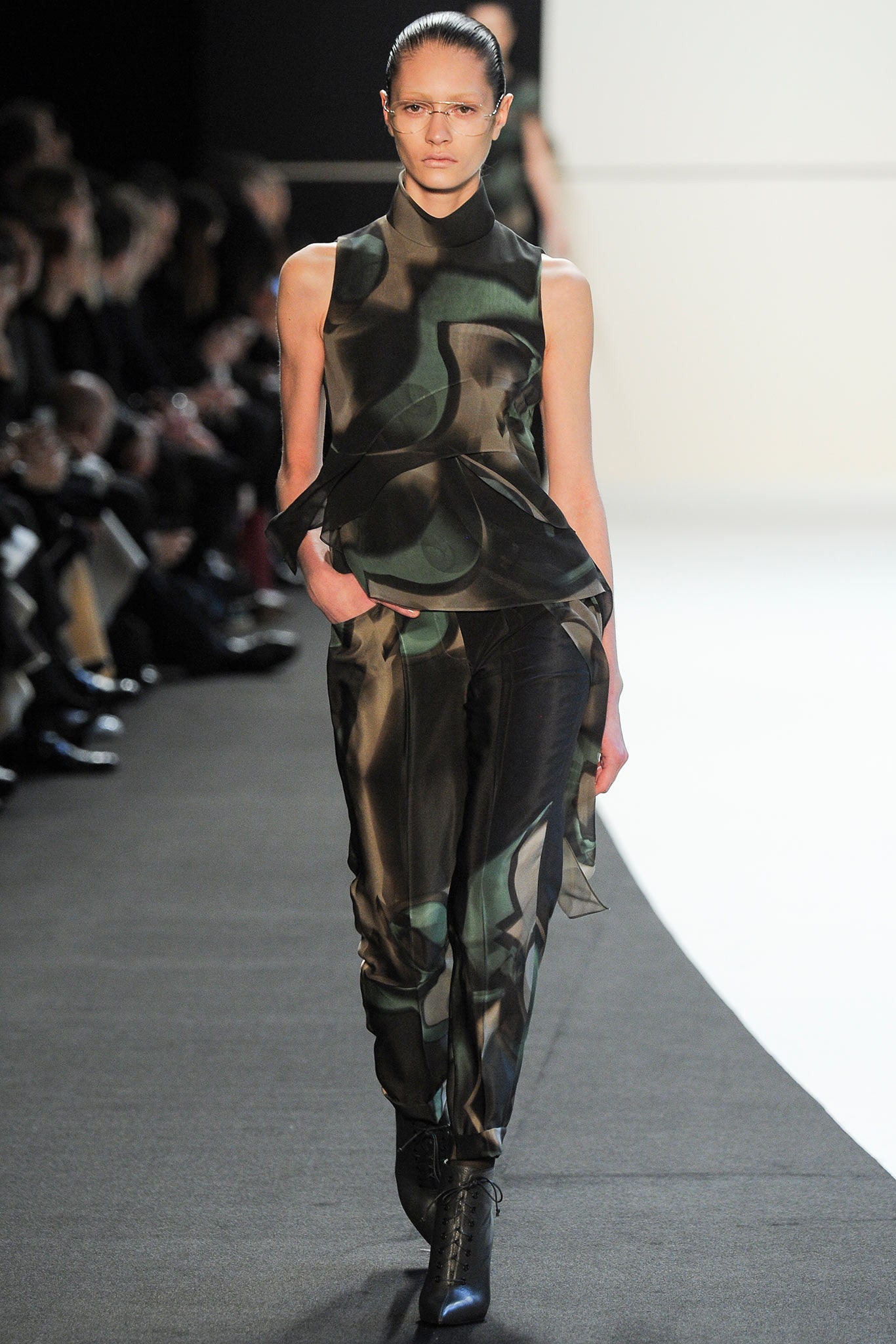 fitted black and green silk top and pants