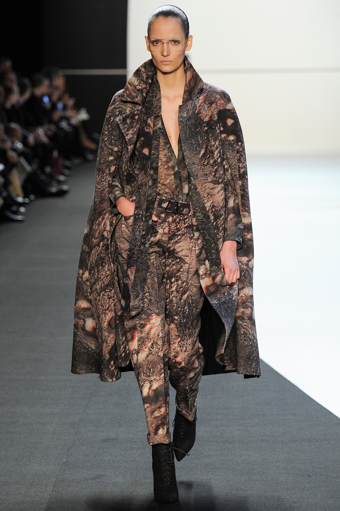 multi-colored wool cape and jumpsuit