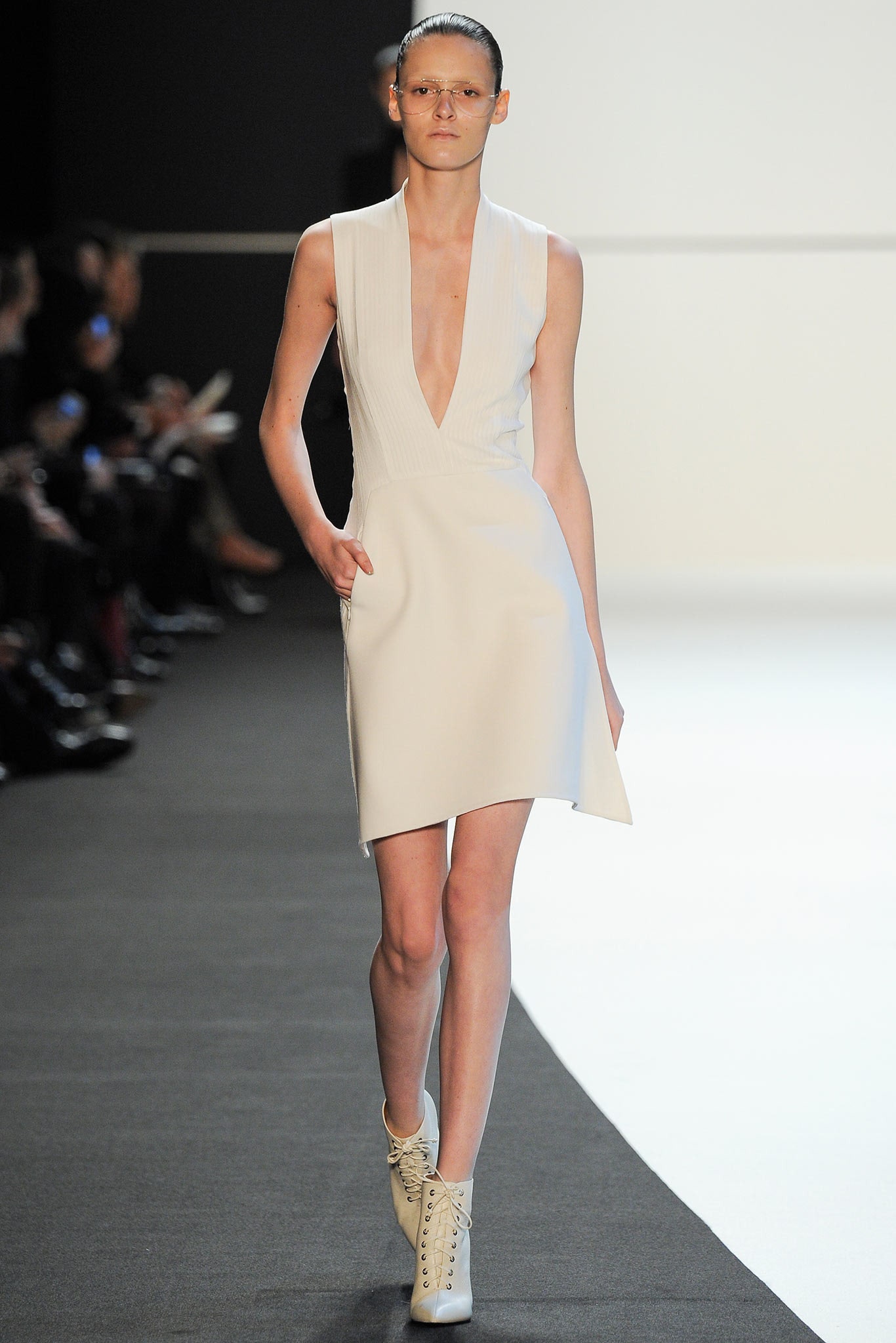 white fitted mini dress with asymmetric detail