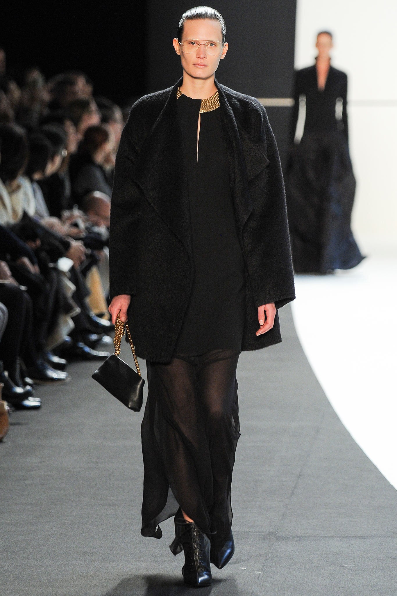 black wool coat and silk dress
