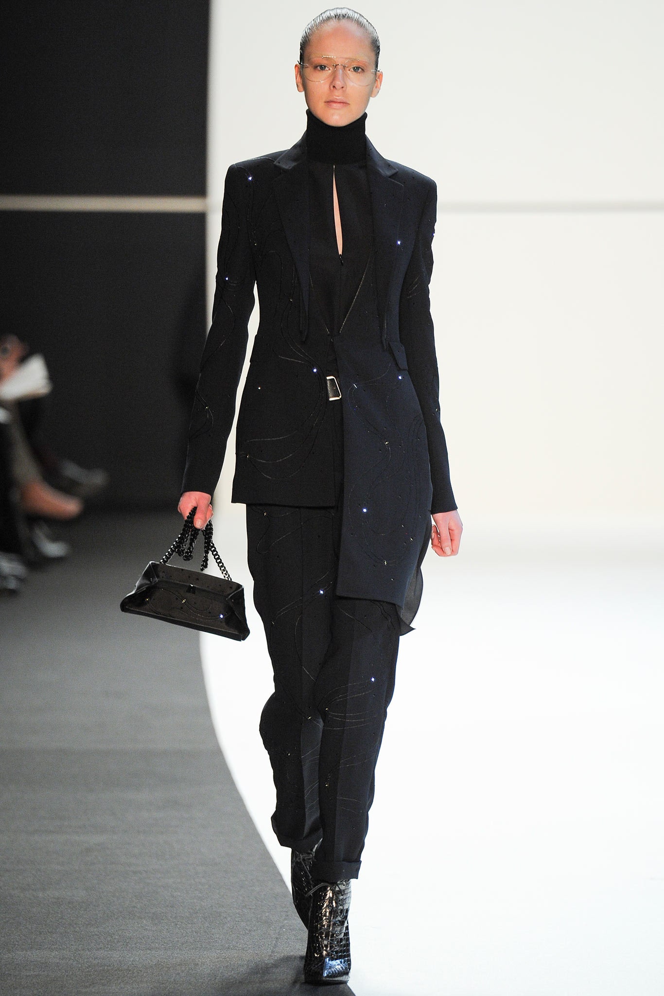 fitted black silk suit
