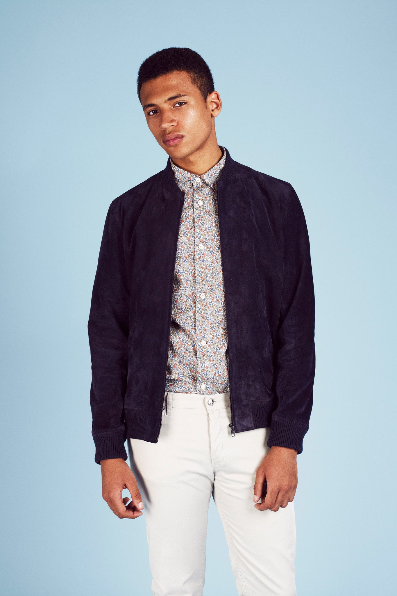 black suede jacket with printed shirt