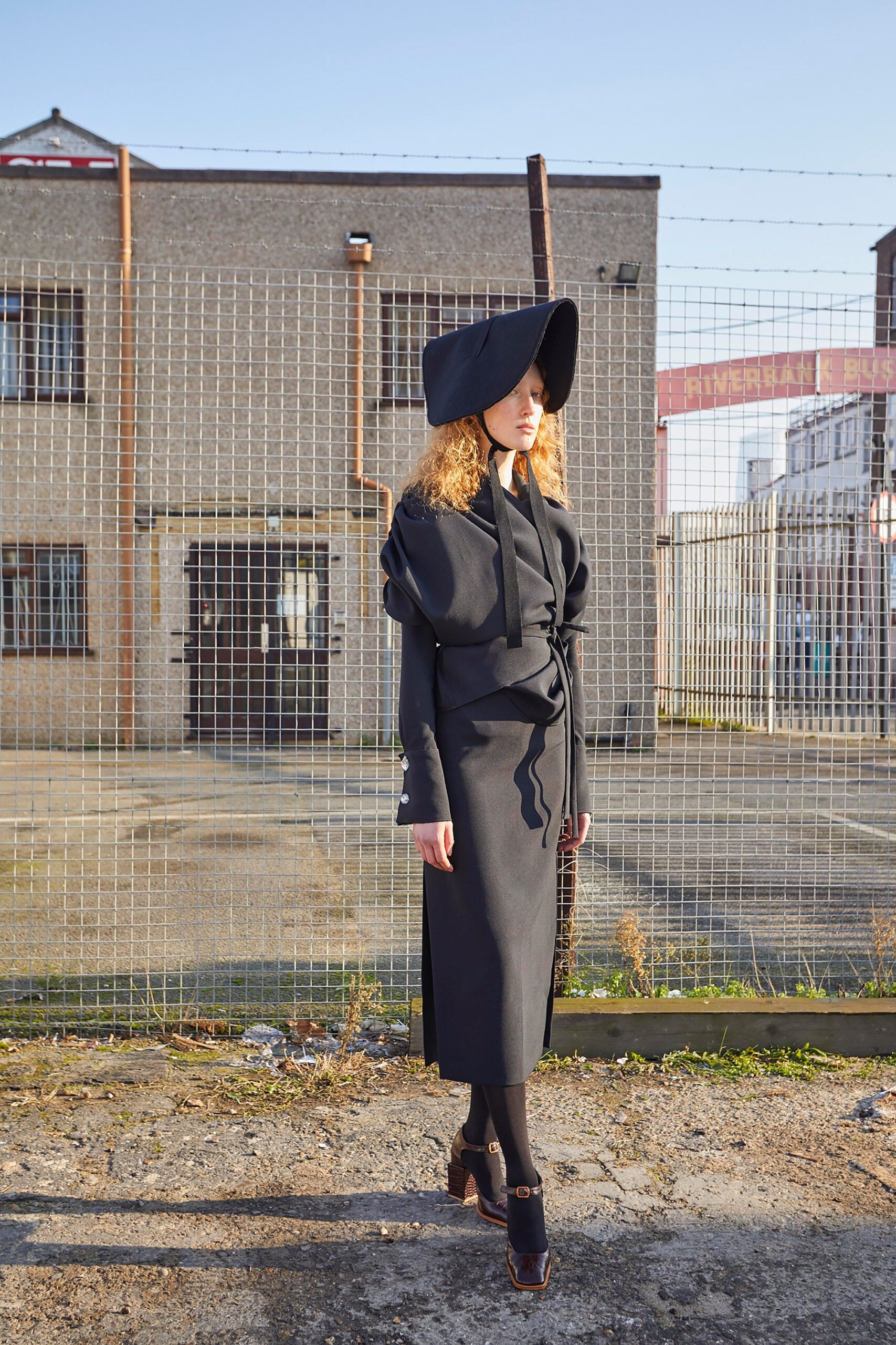 black cotton long-sleeve collared fitted belted midi dress