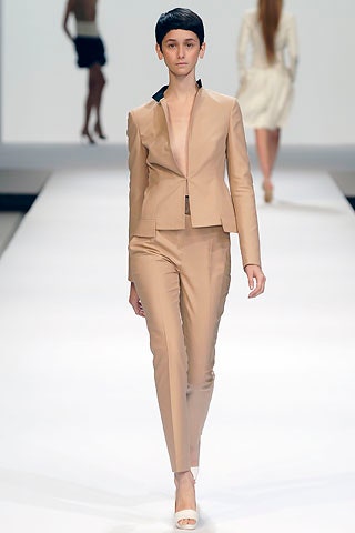 beige tailored suit with open-toe shoes