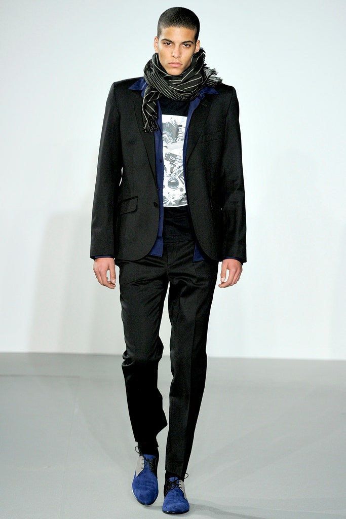 black tailored suit with white shirt