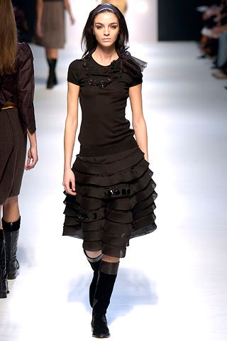 black fitted top and tiered skirt