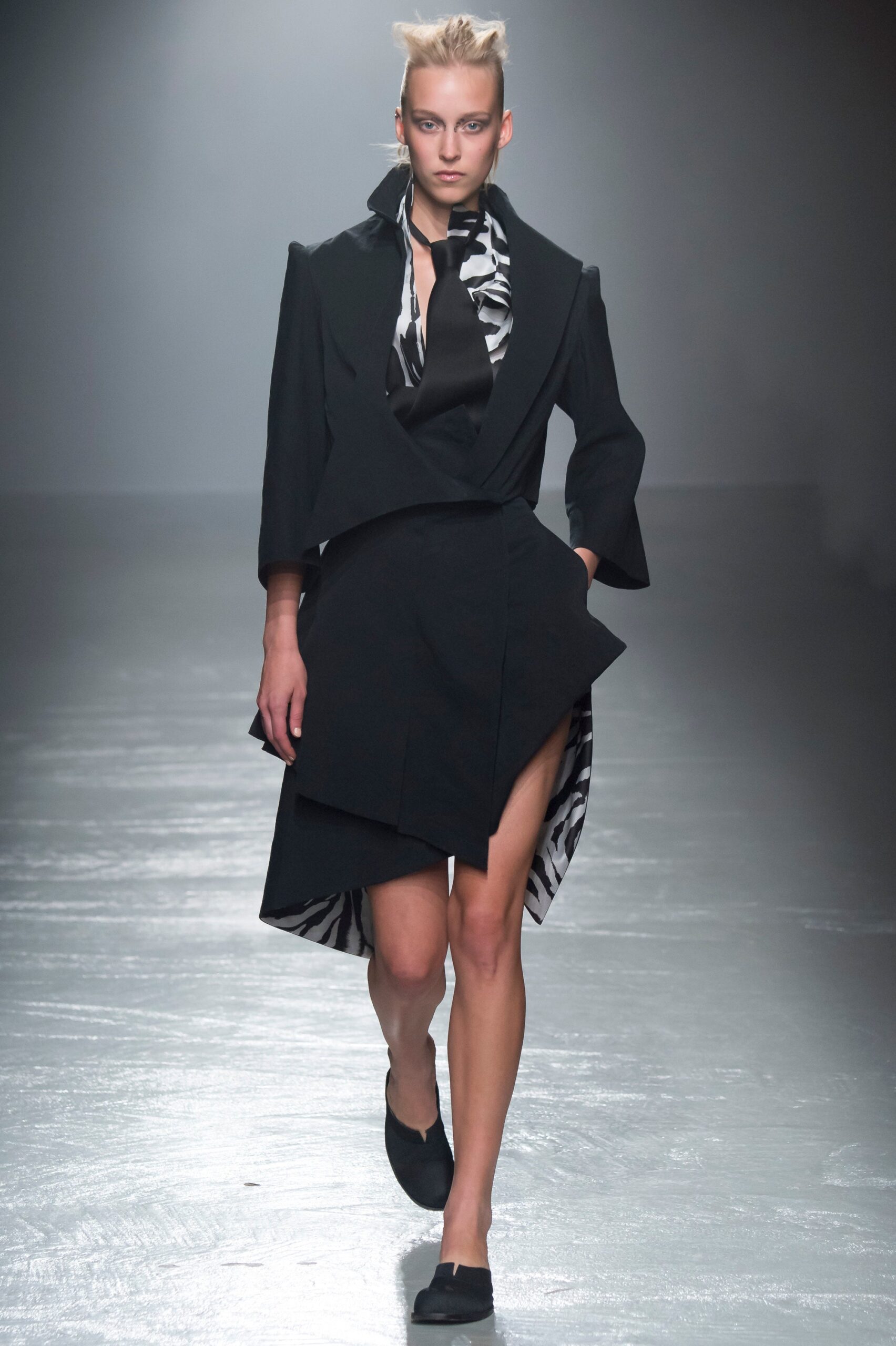 black wool long-sleeve collared structured layered coat