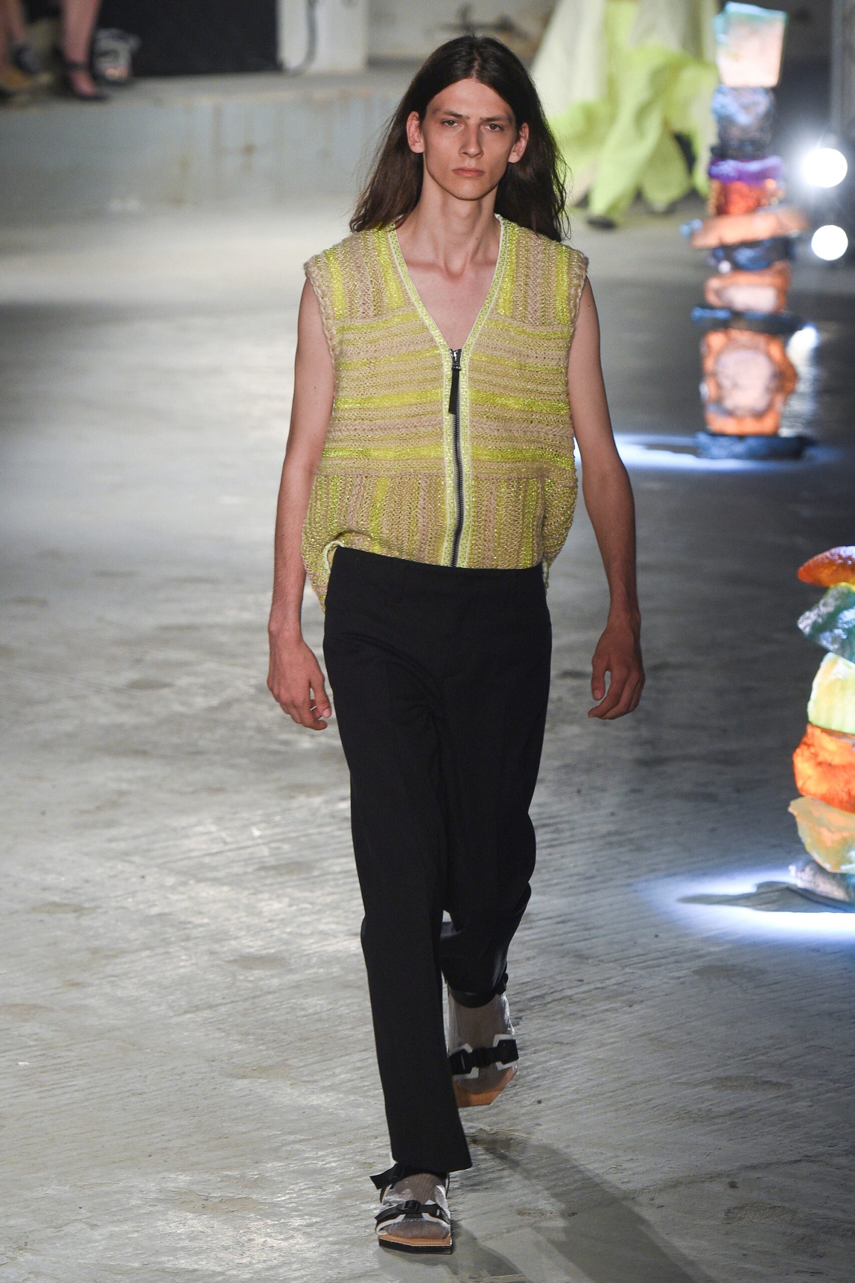 yellow cotton sleeveless vest and black pants