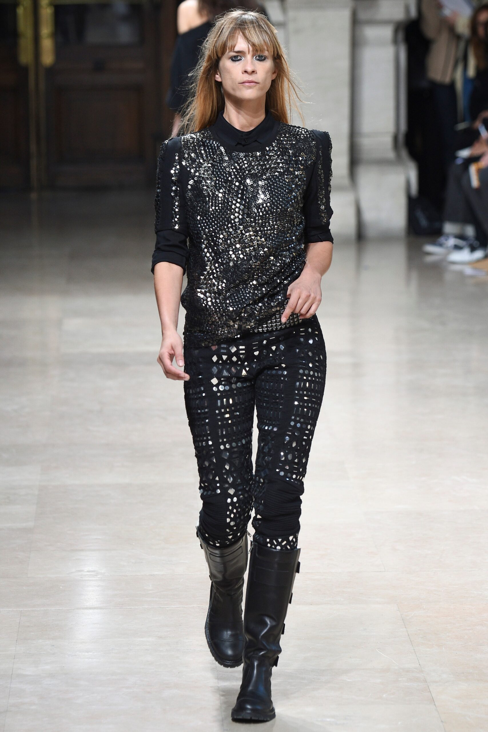 black embellished top with slim pants