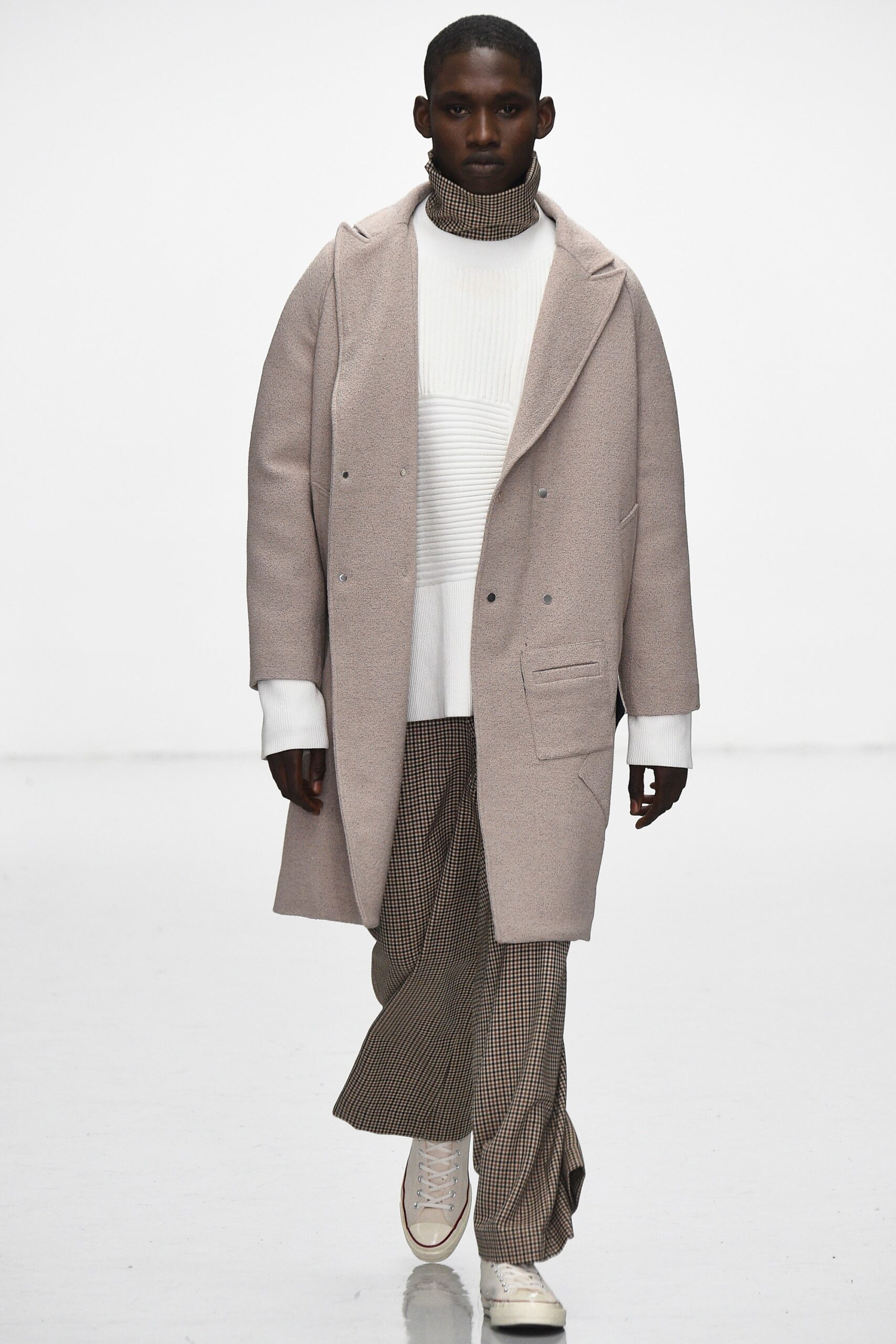 beige wool coat with white top