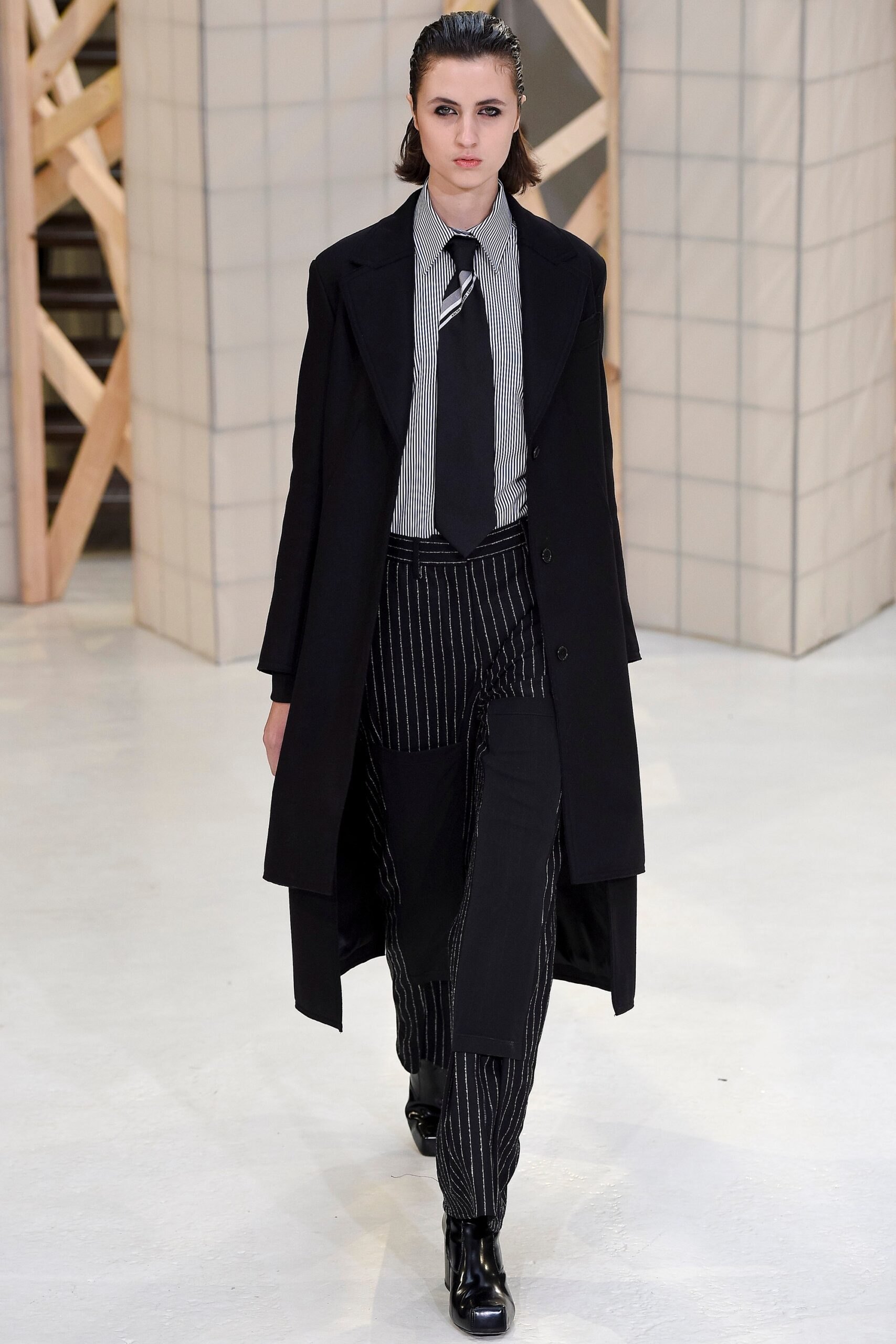 black tailored coat with striped shirt