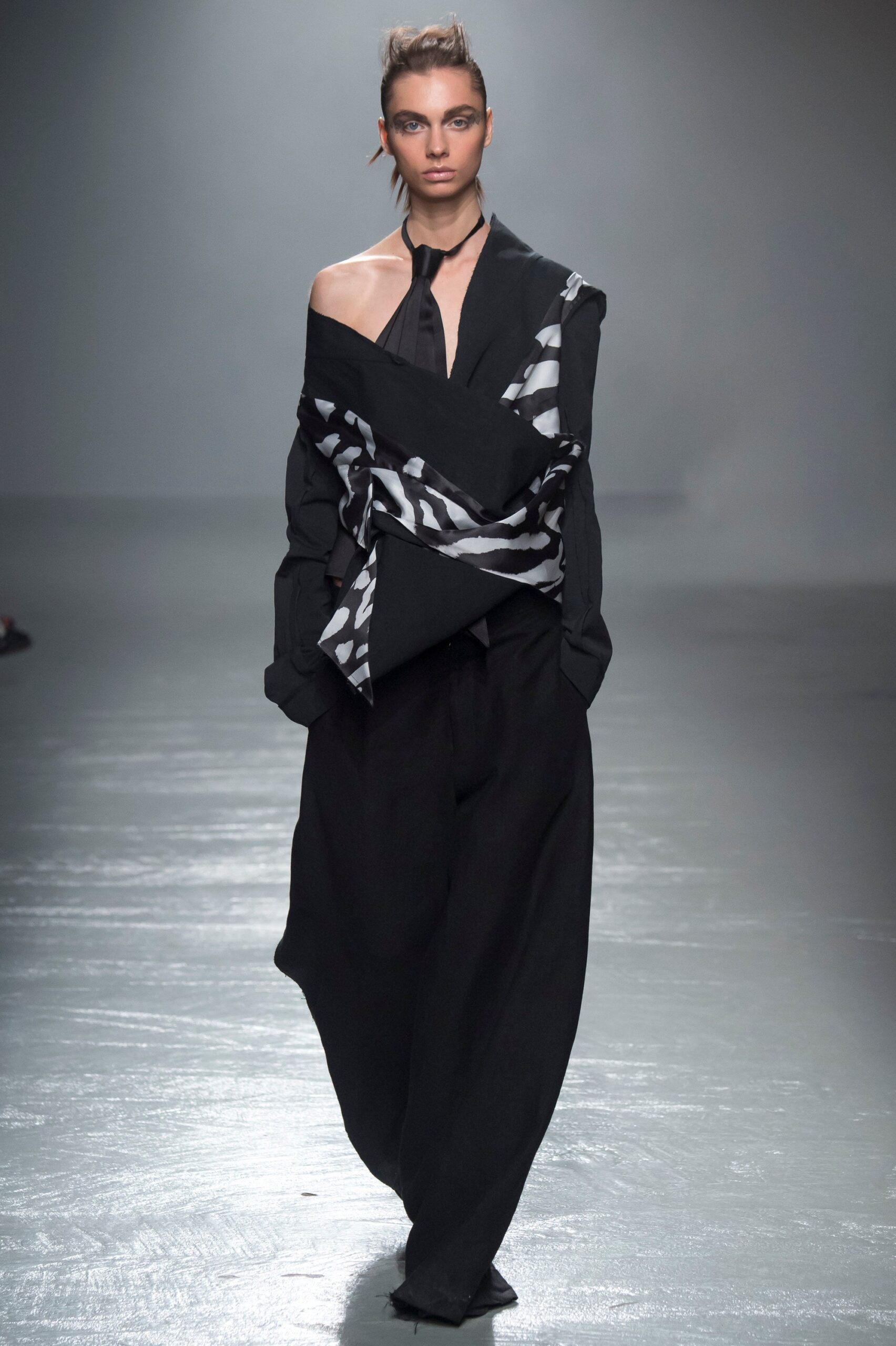 black and white asymmetric shirt with wide-leg pants