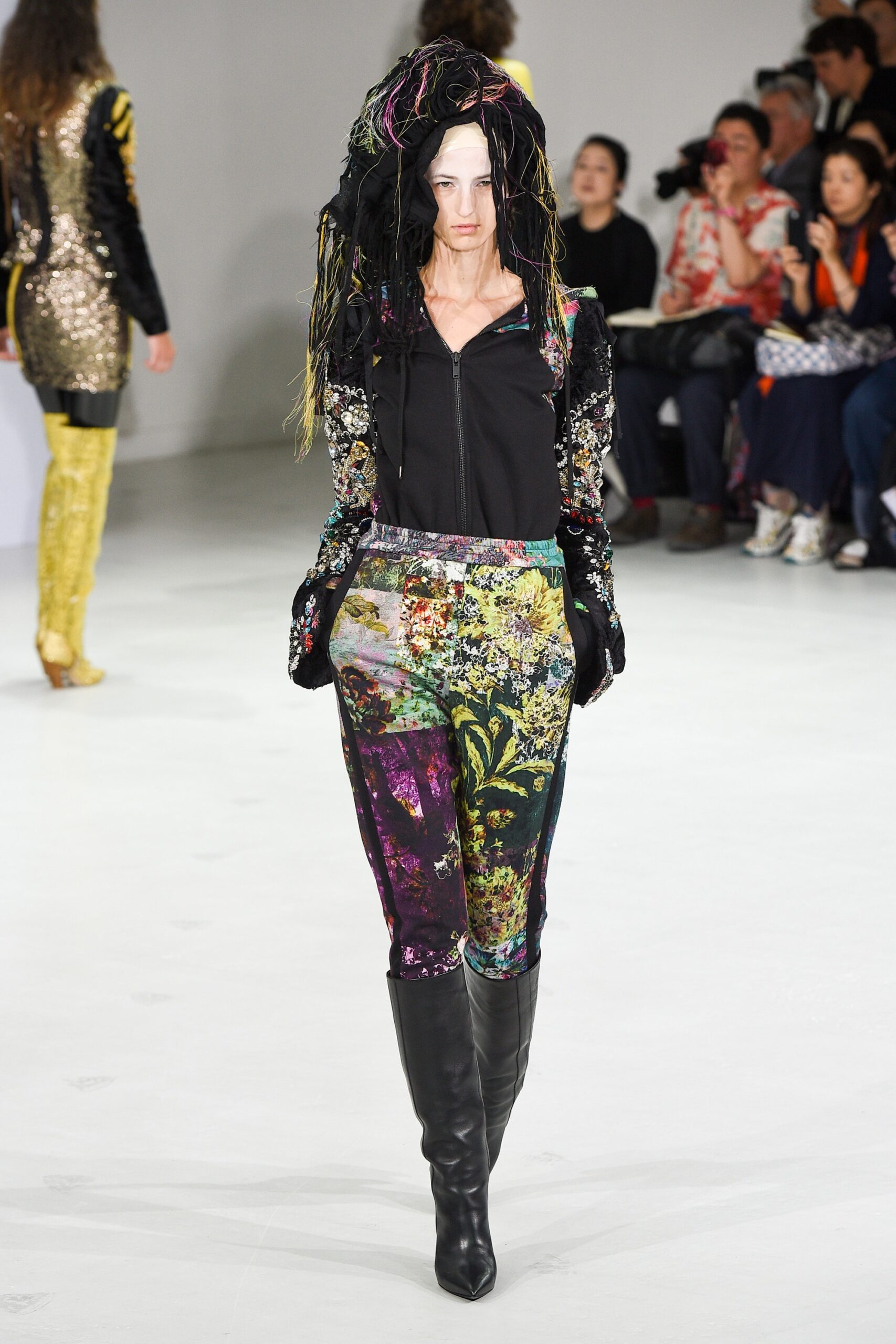 black silk fitted top with multi flared pants