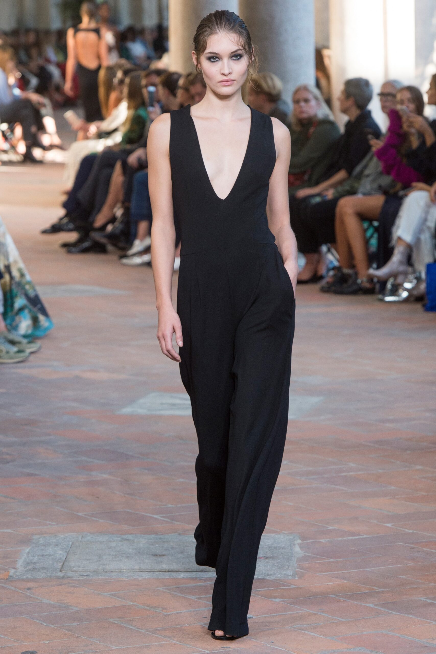 black fitted sleeveless jumpsuit