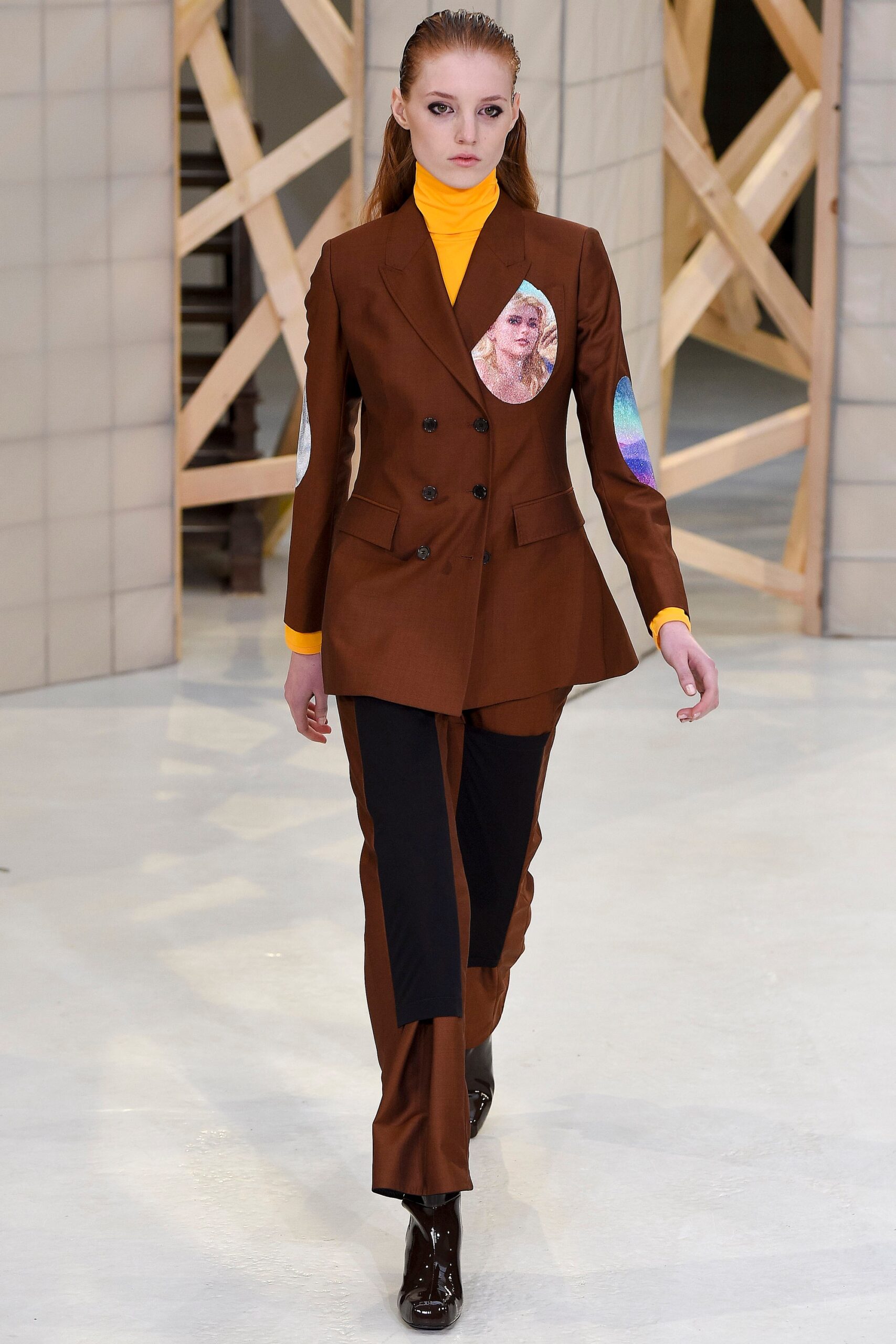 brown tailored suit with yellow top
