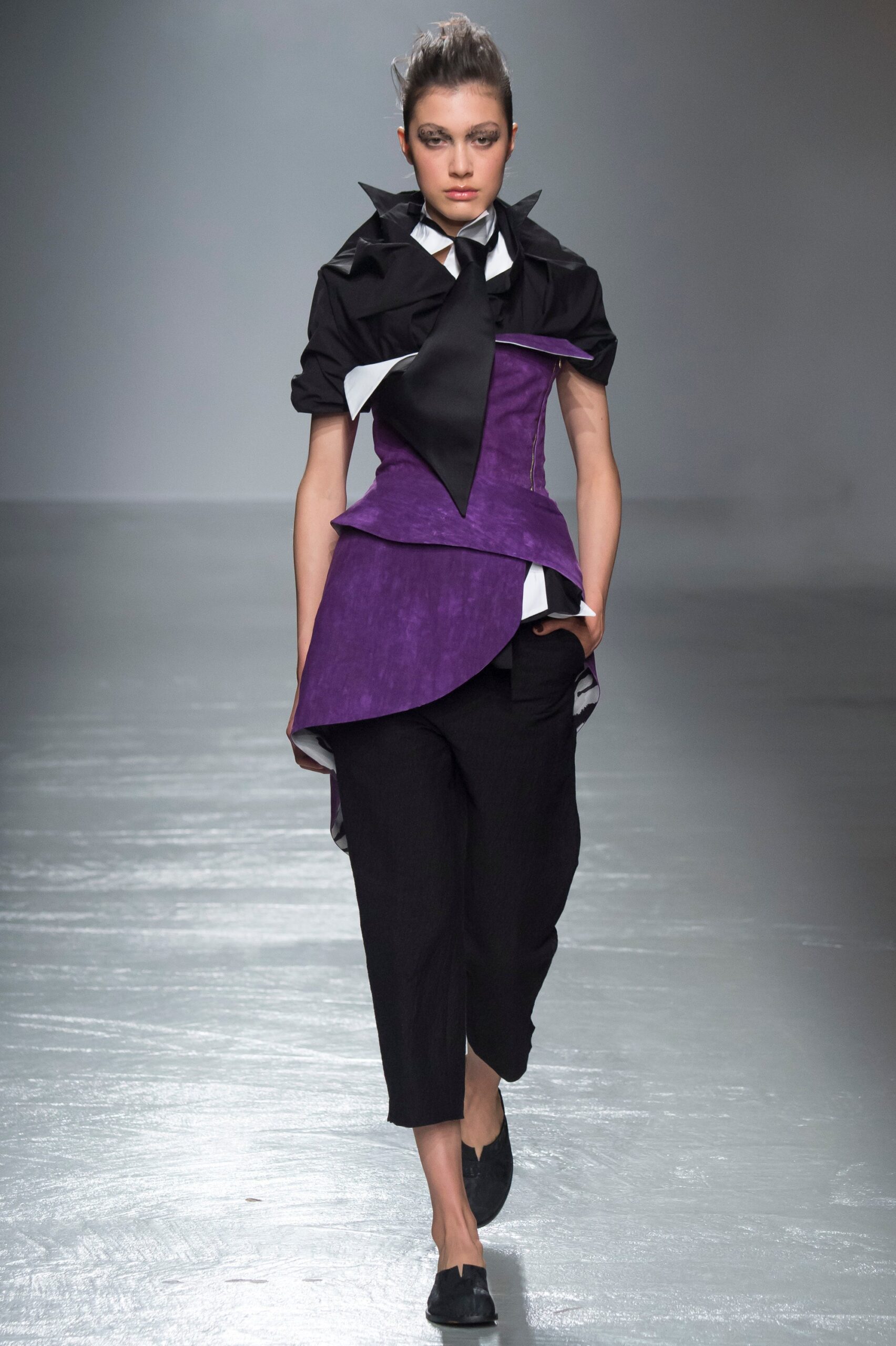 purple velvet fitted top with black pants