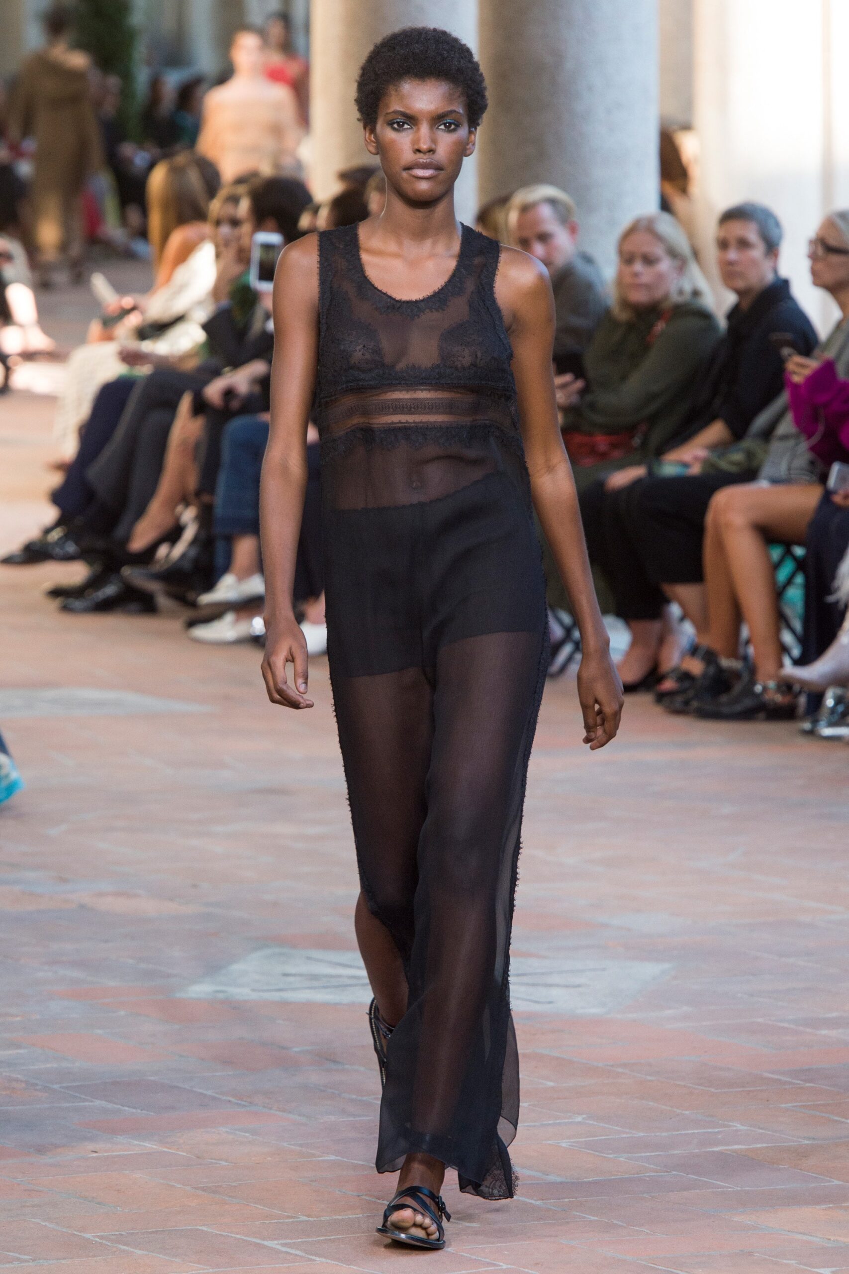 black sheer sleeveless dress