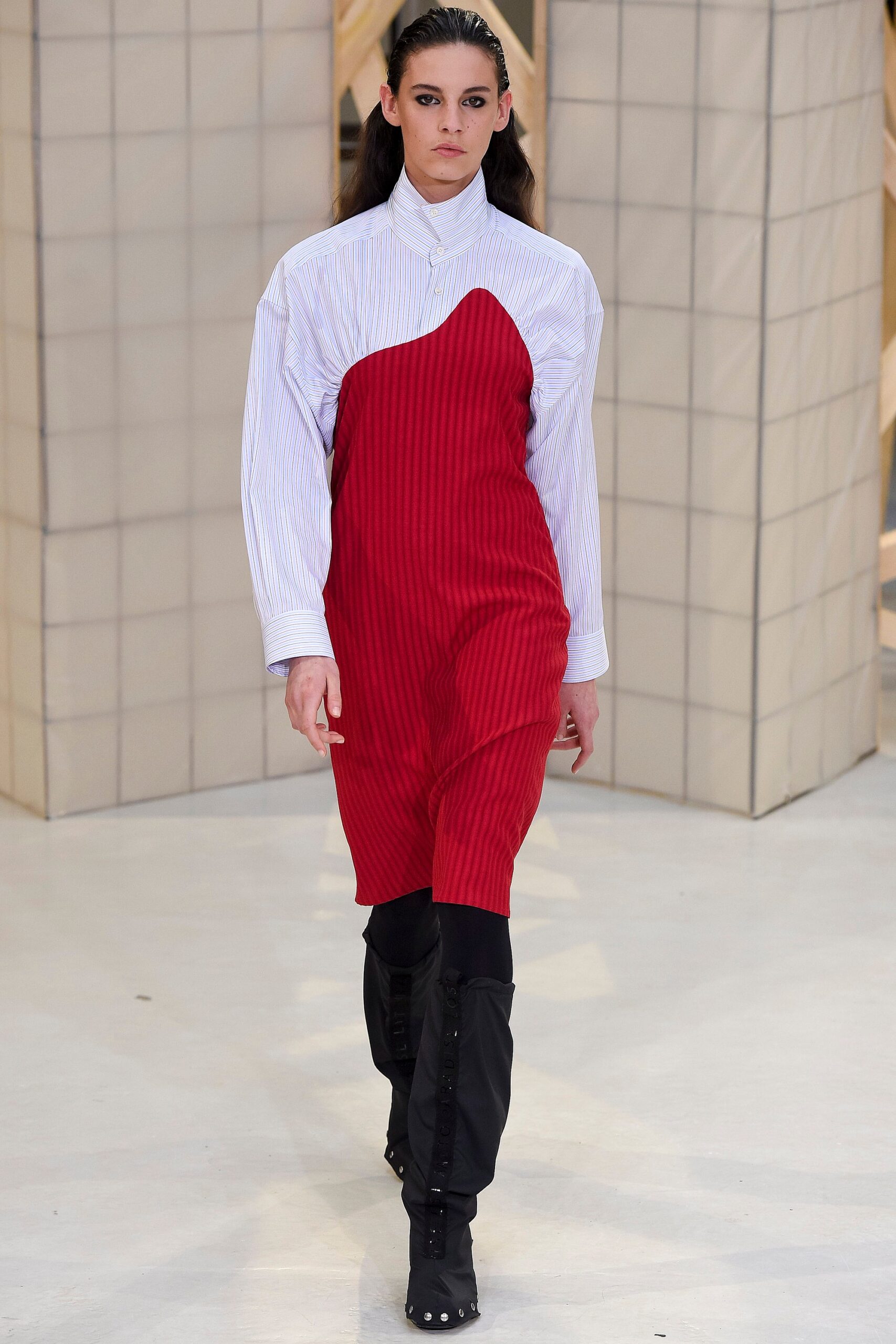 asymmetric red and white dress with black pants