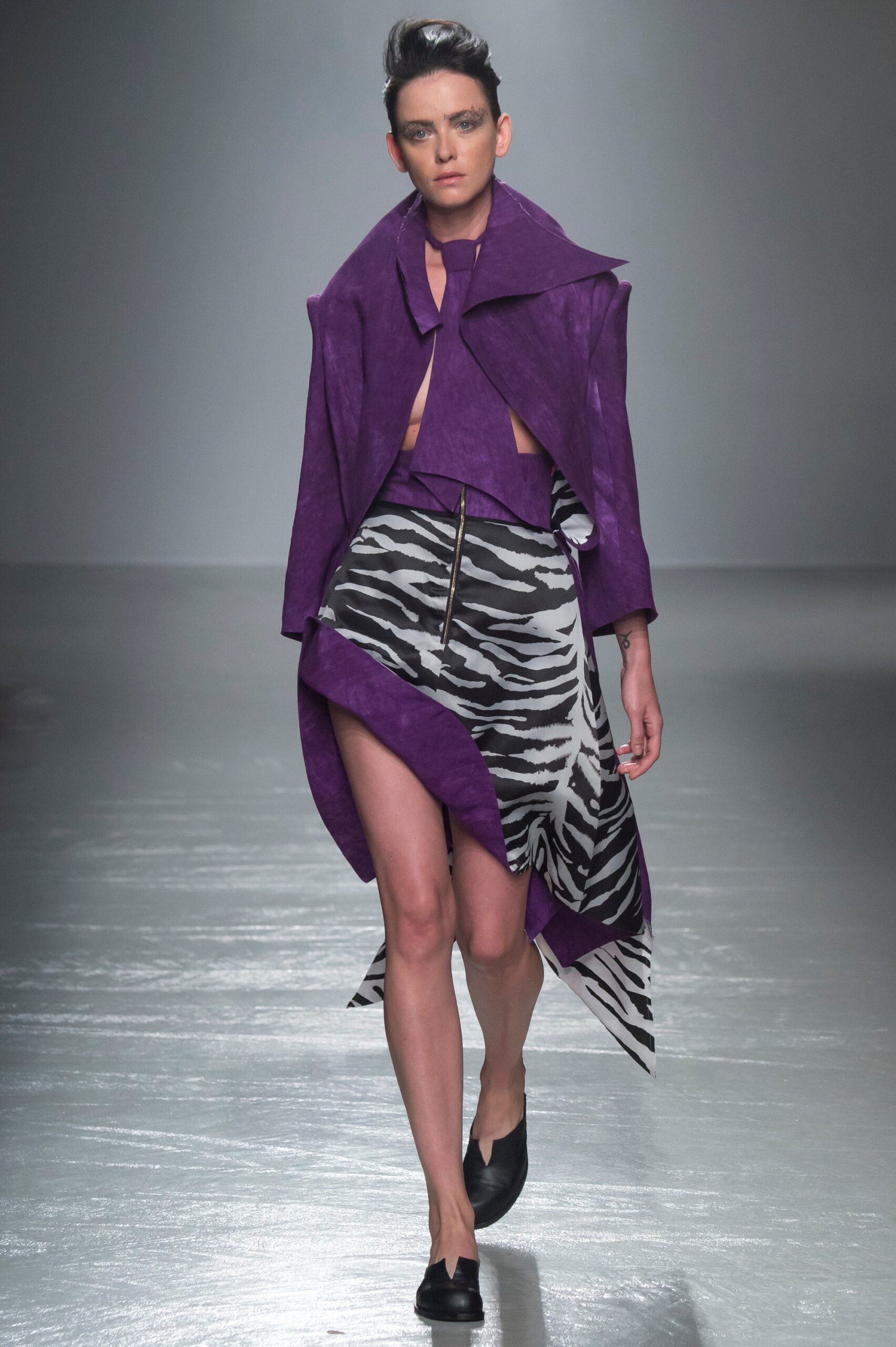 purple suede coat and zebra skirt