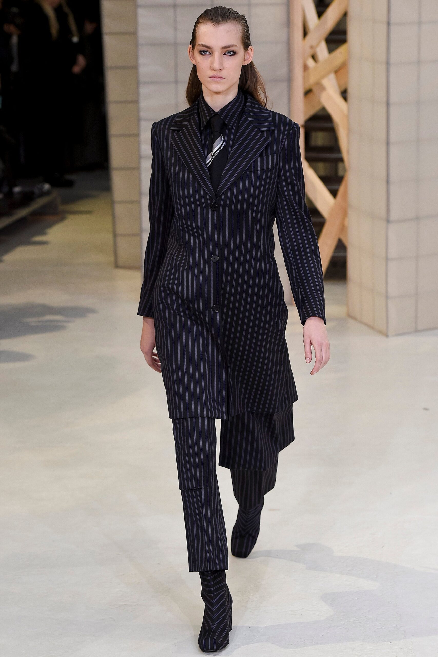 tailored black and blue striped suit