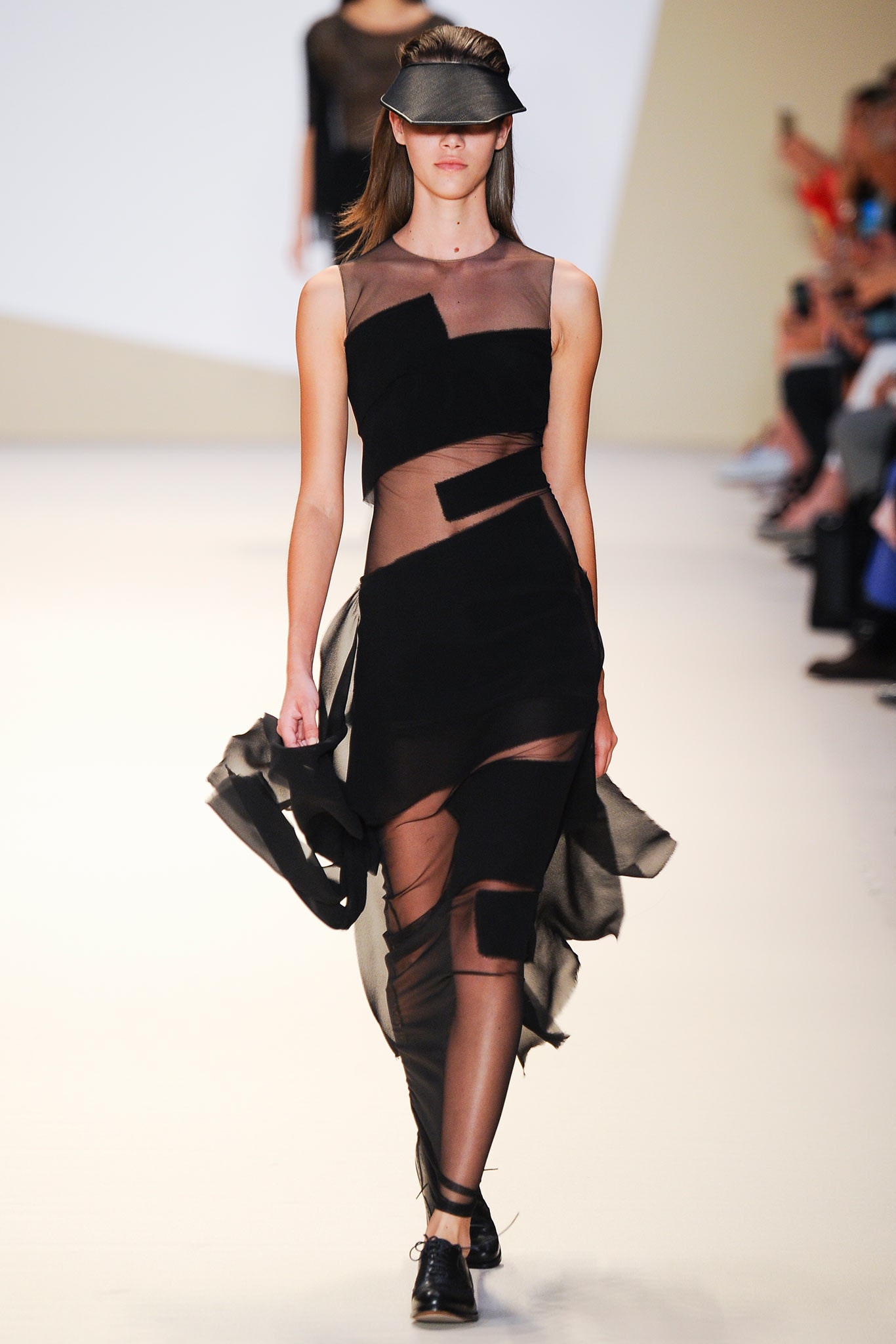 black flowing sleeveless dress