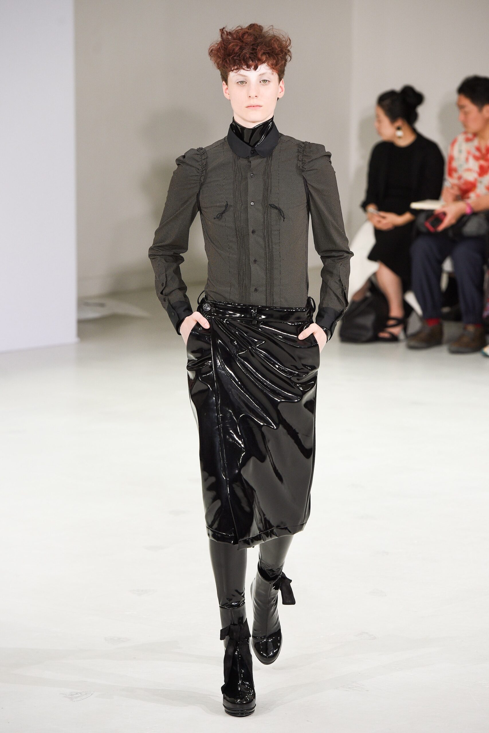 black fitted shirt and vinyl skirt