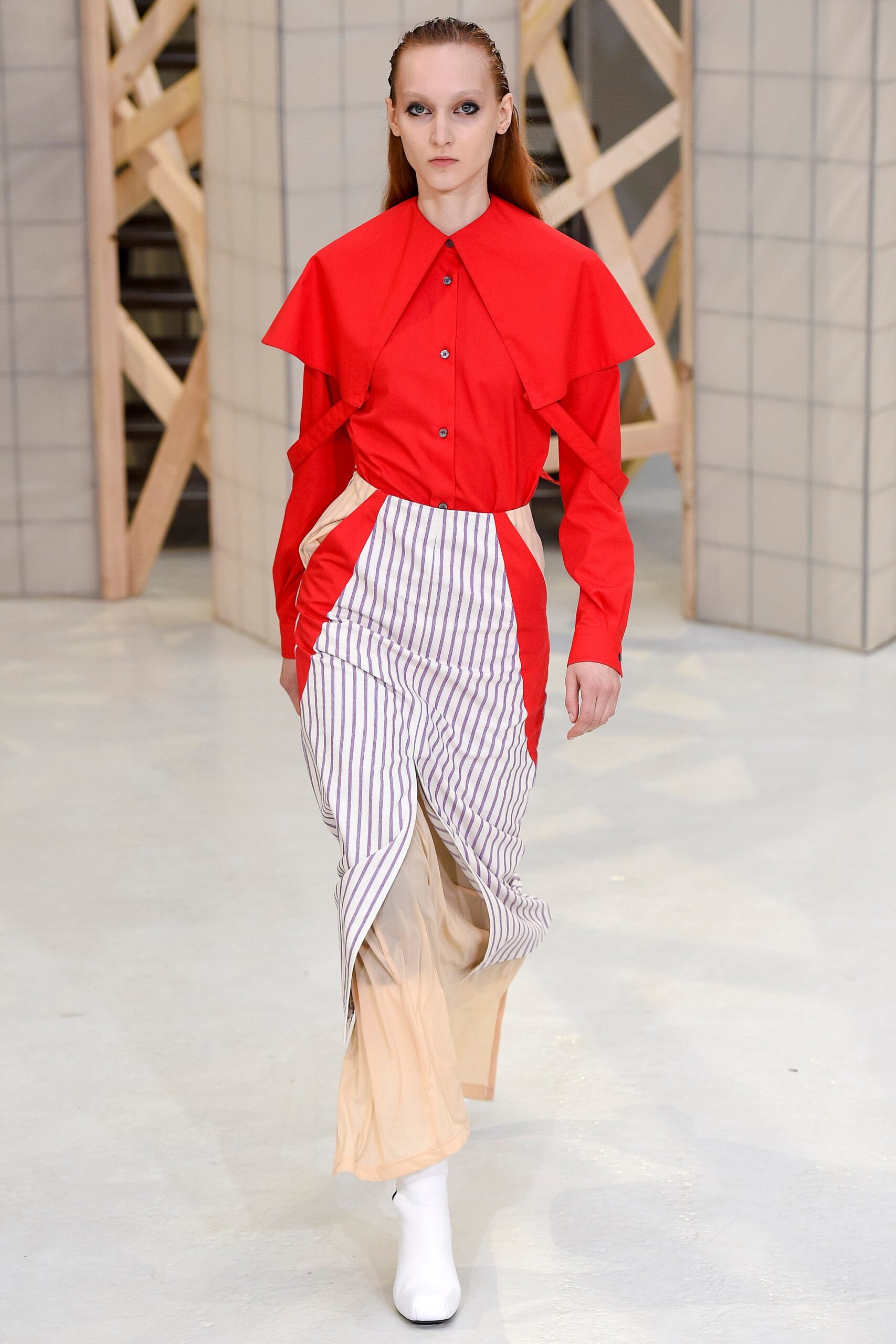 red fitted shirt with asymmetric skirt