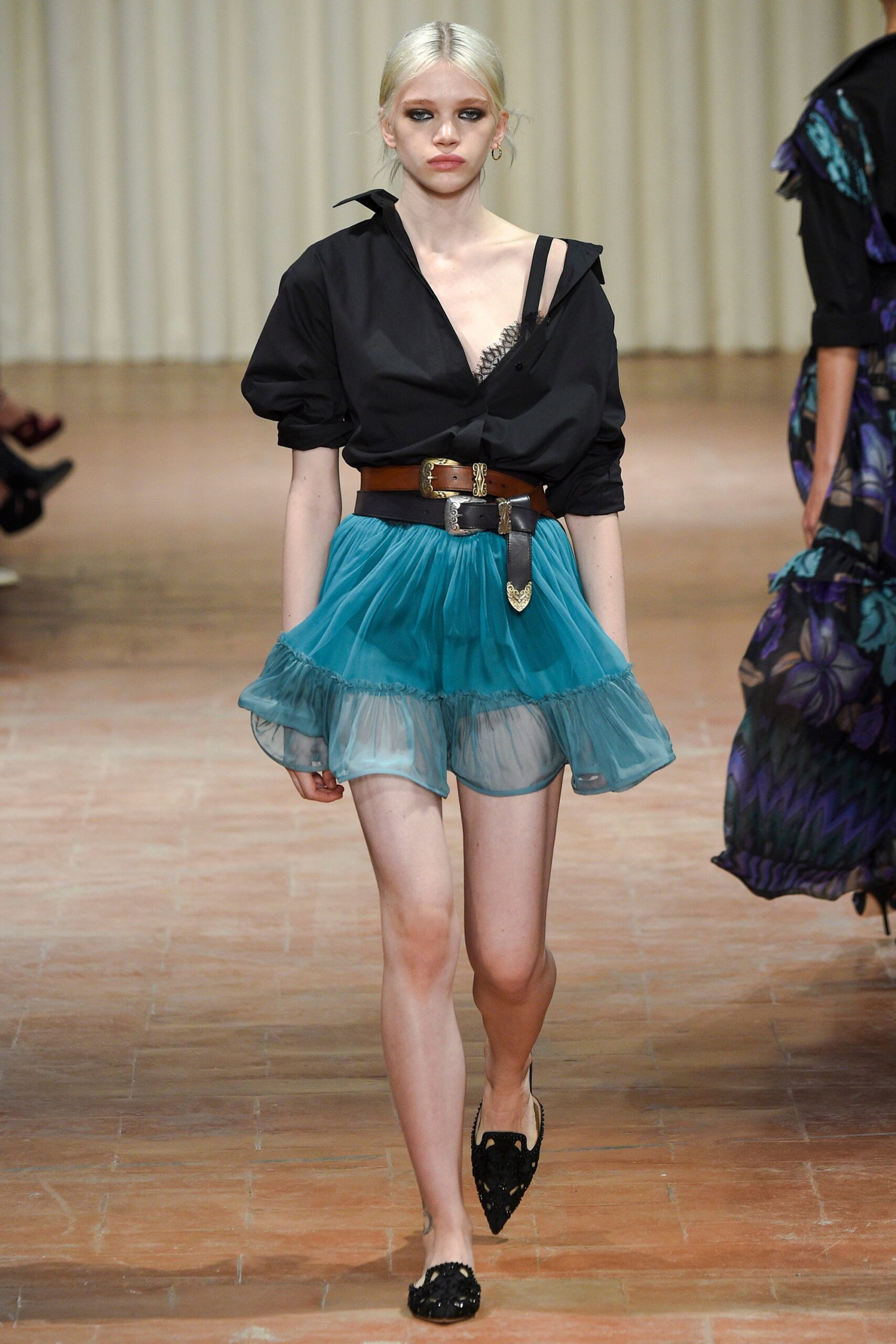 black blouse with blue skirt