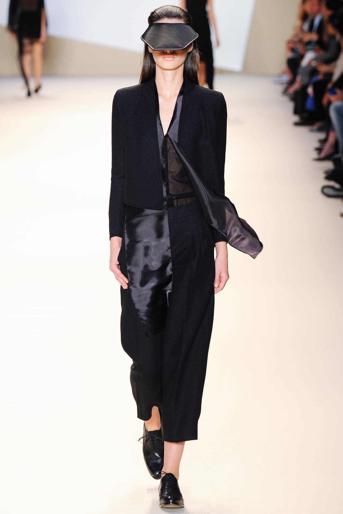 black silk fitted blazer and relaxed pants