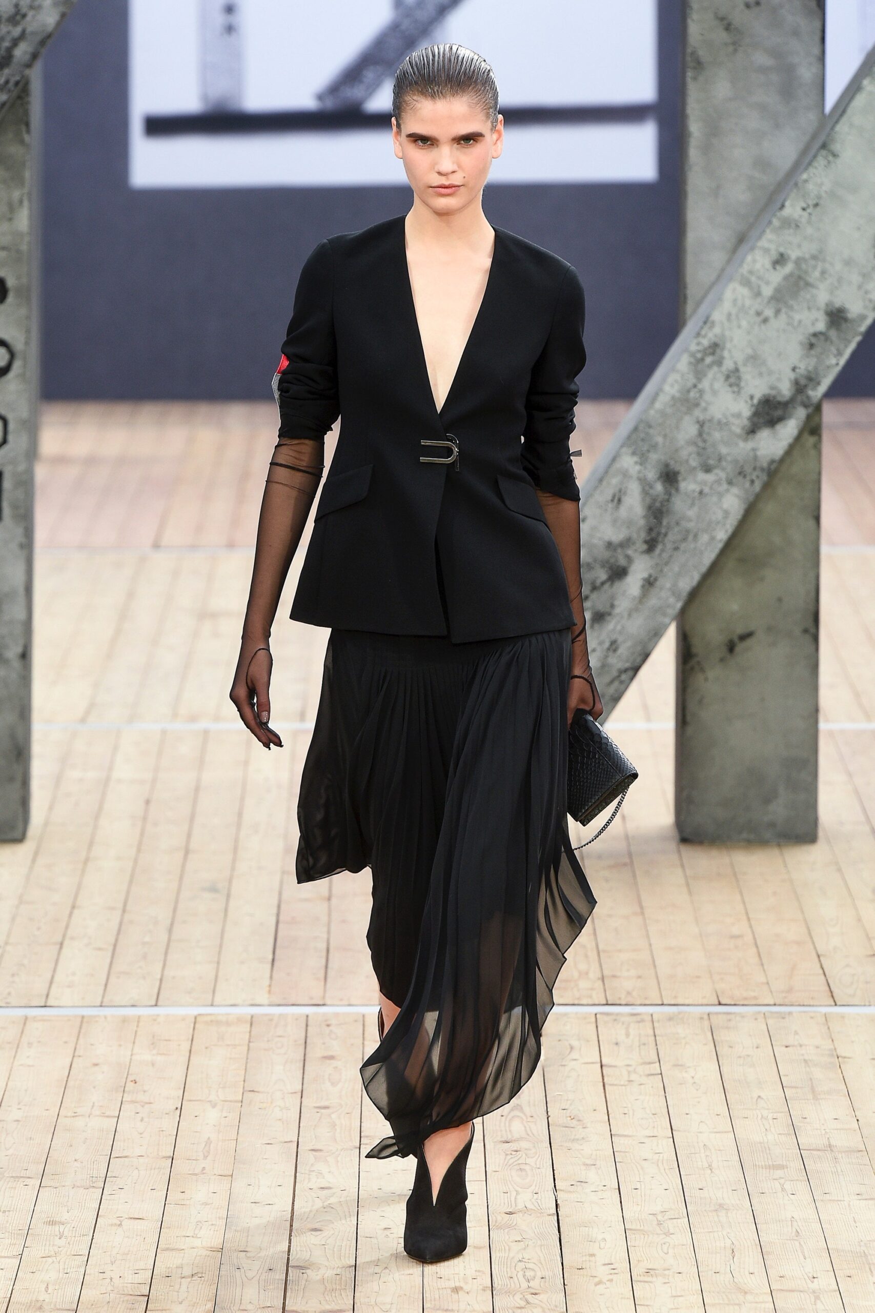 black silk fitted high-waisted pleated flowing midi skirt