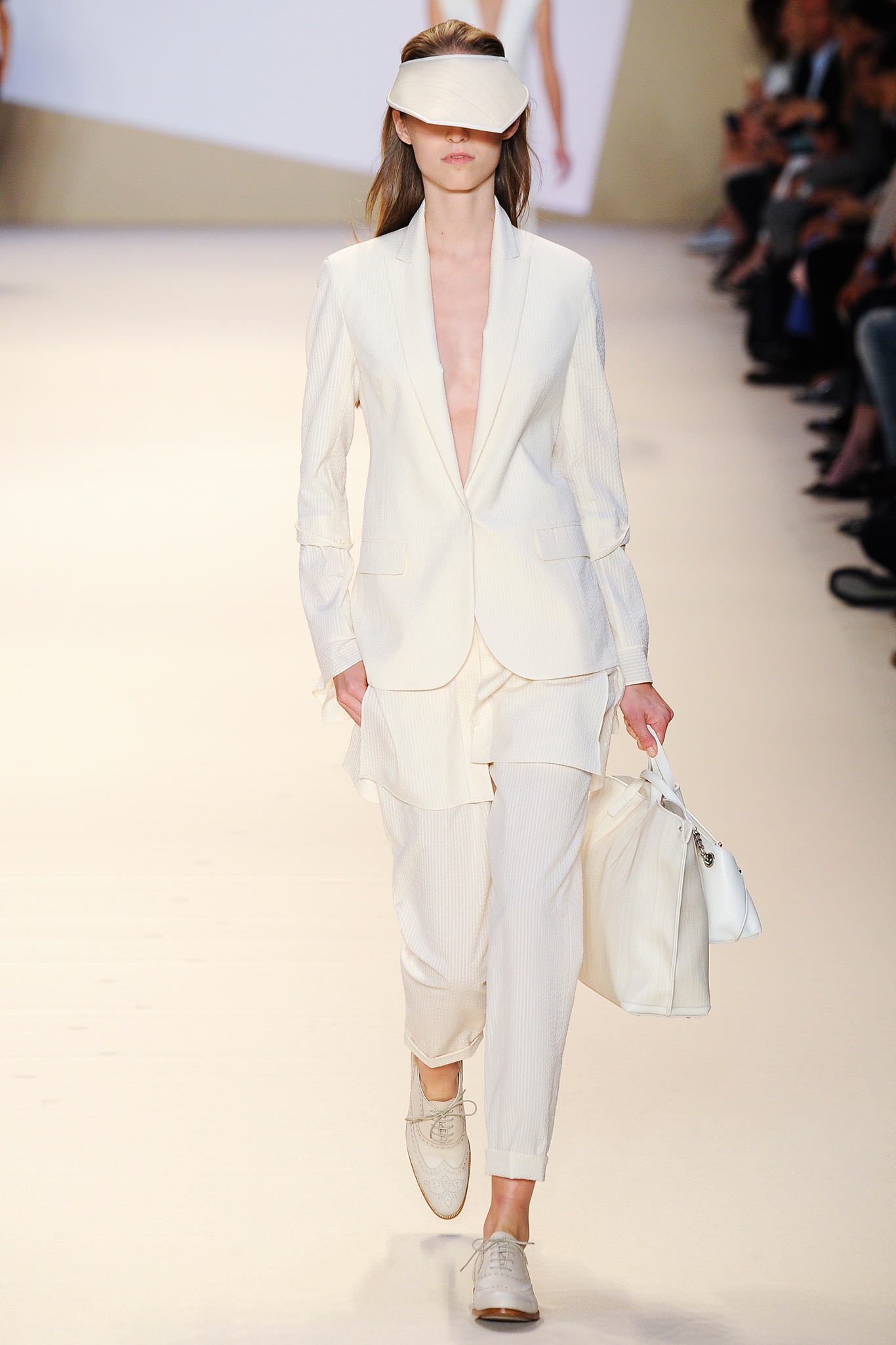 white fitted suit with sneakers