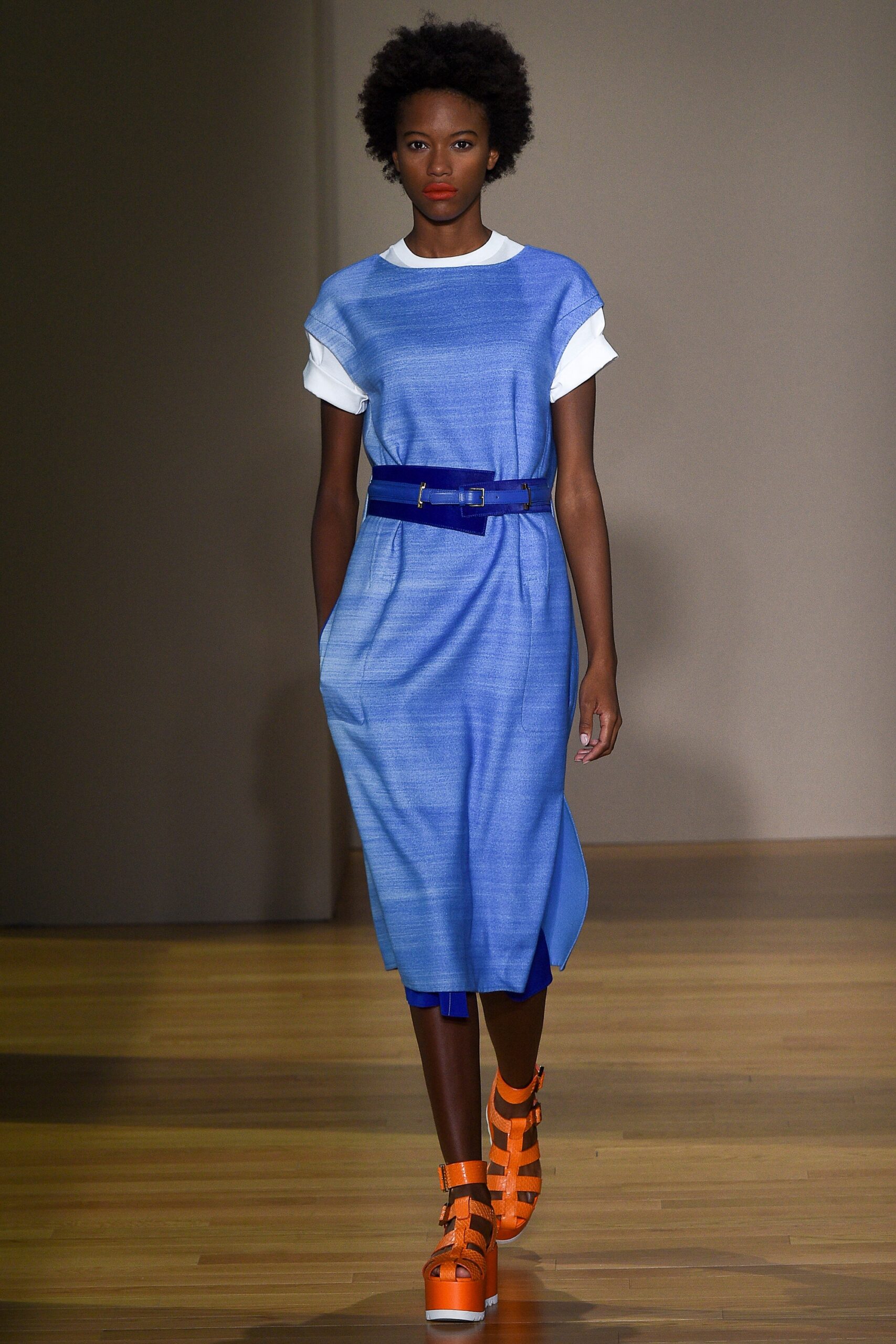 blue belted midi dress with orange shoes