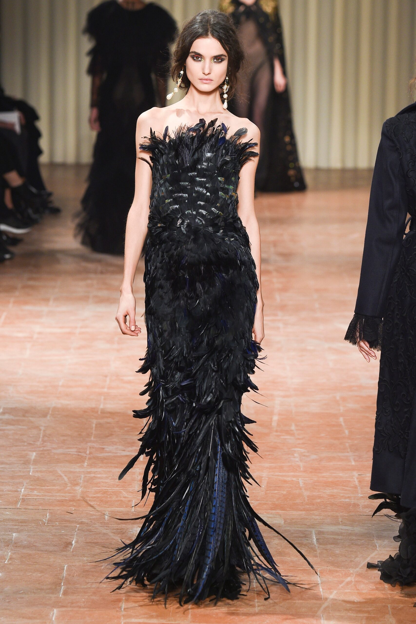 black feathered strapless gown