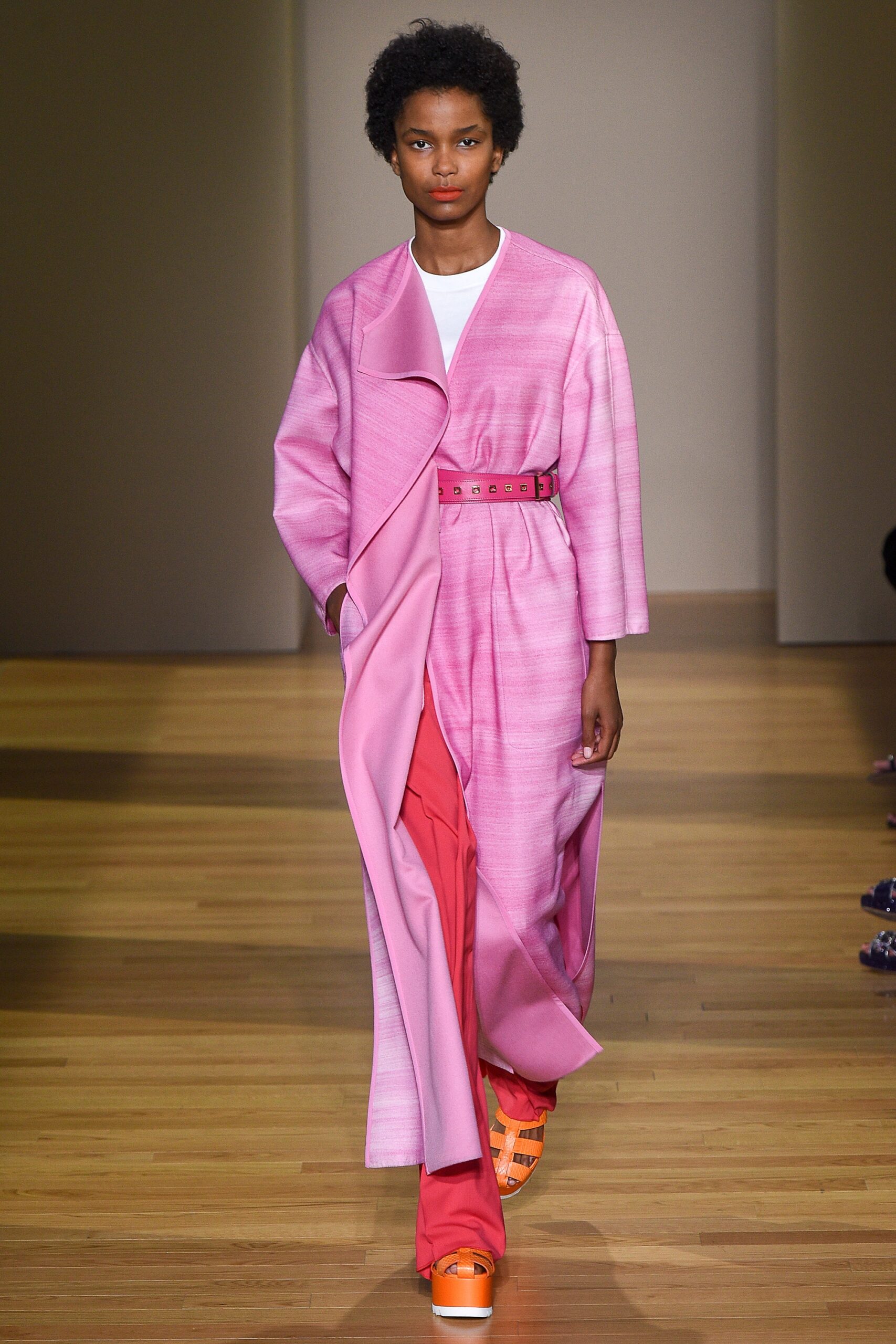 pink coat with red pants