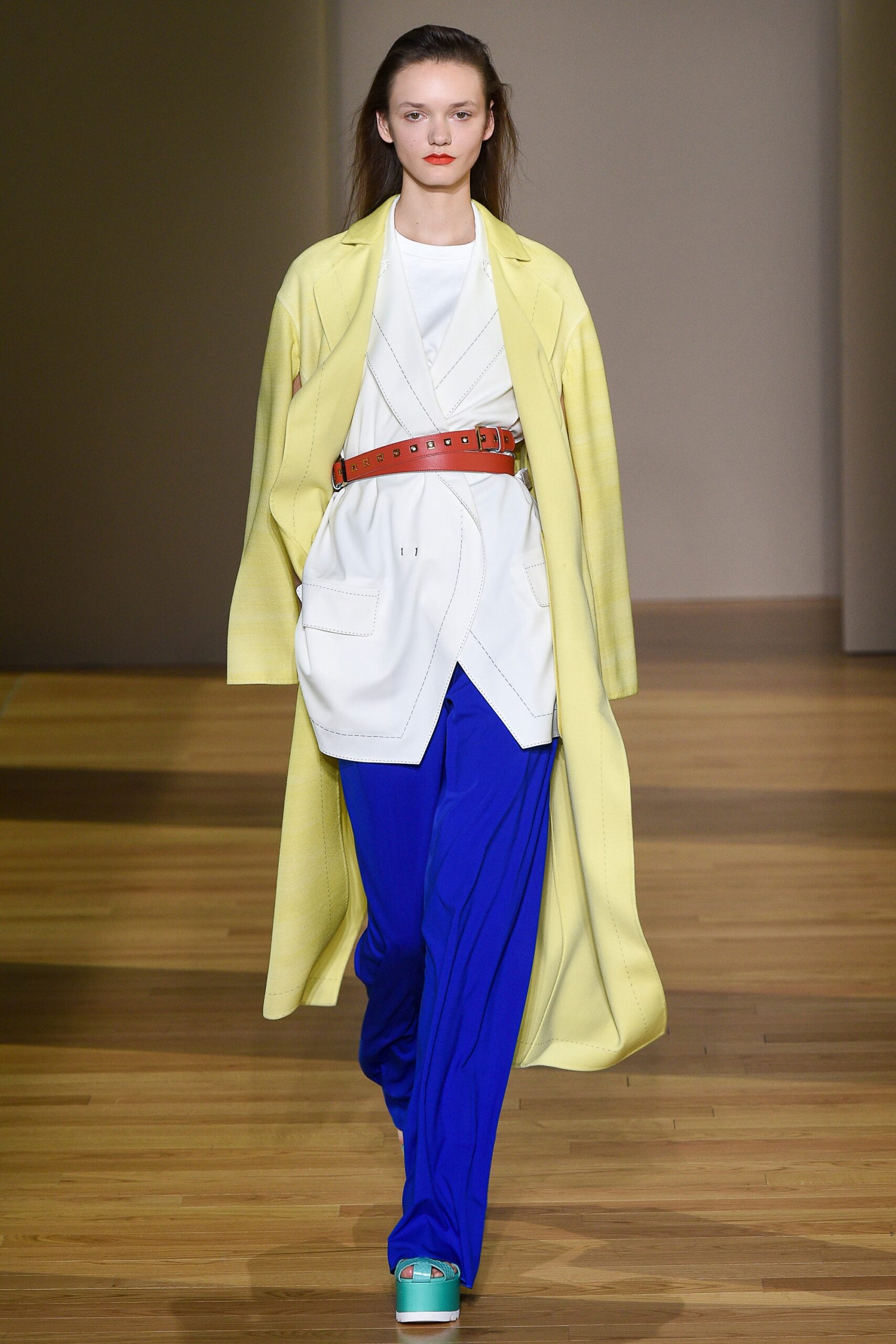 yellow coat with white blazer