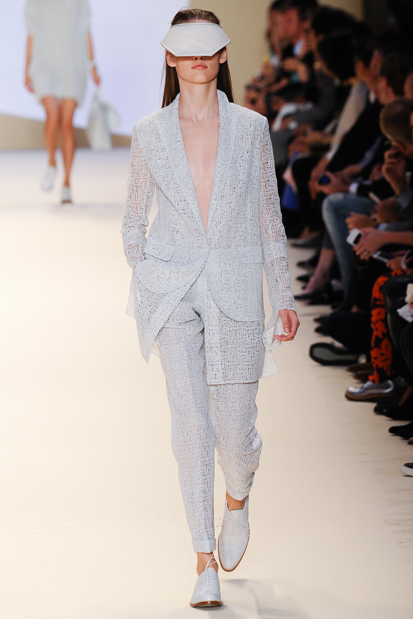 white fitted suit with hat