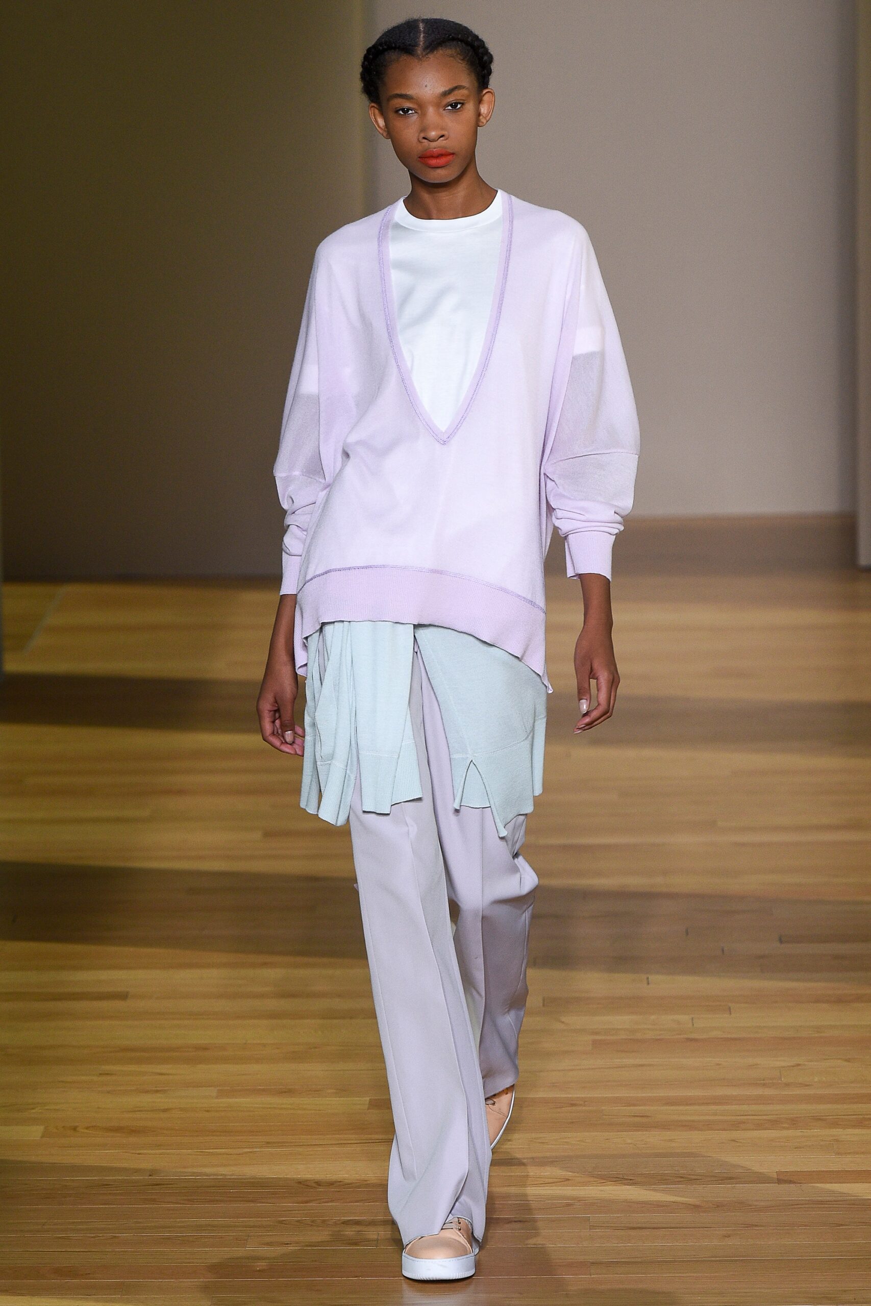 lavender relaxed top with gray pants