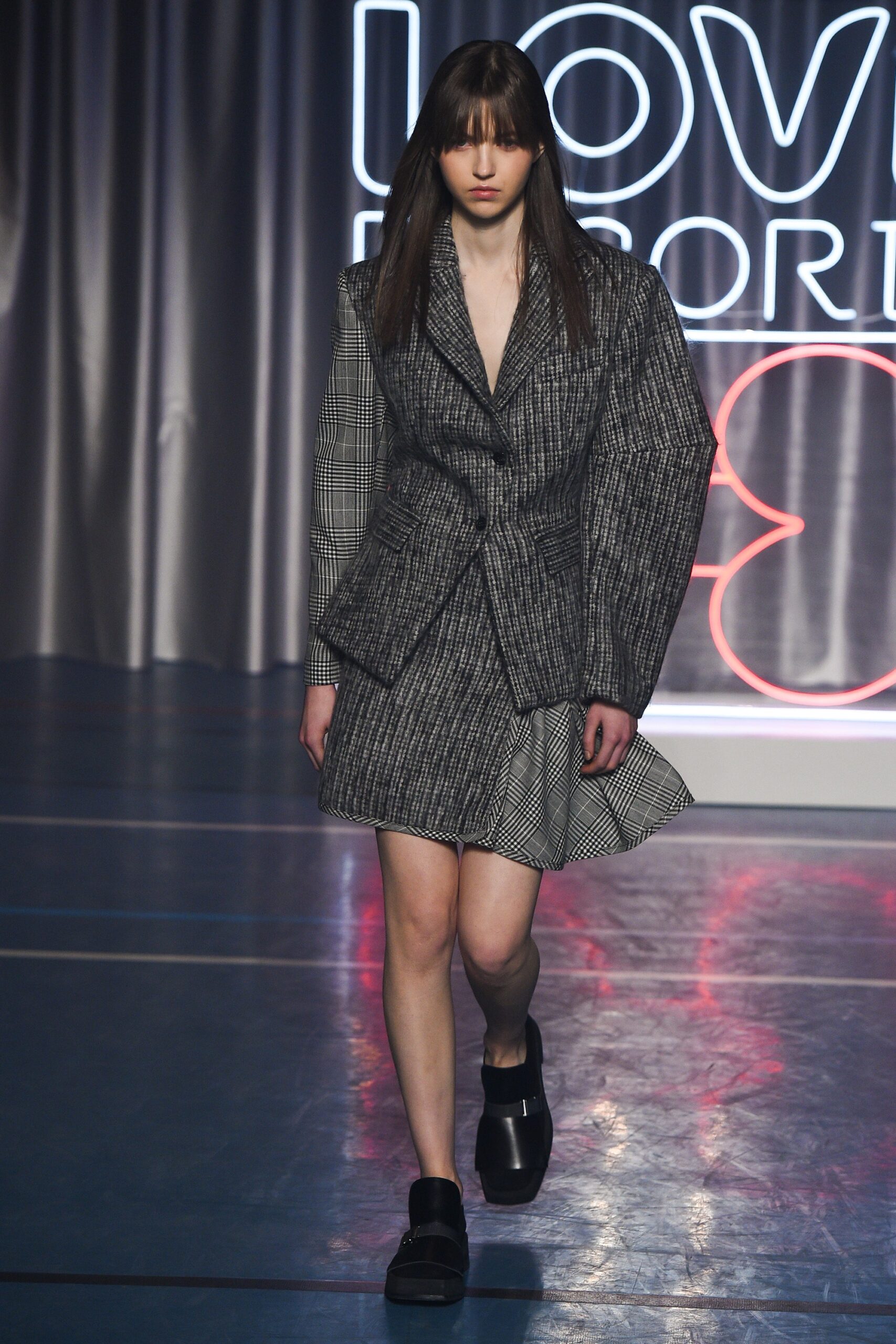 black and white checked blazer and skirt