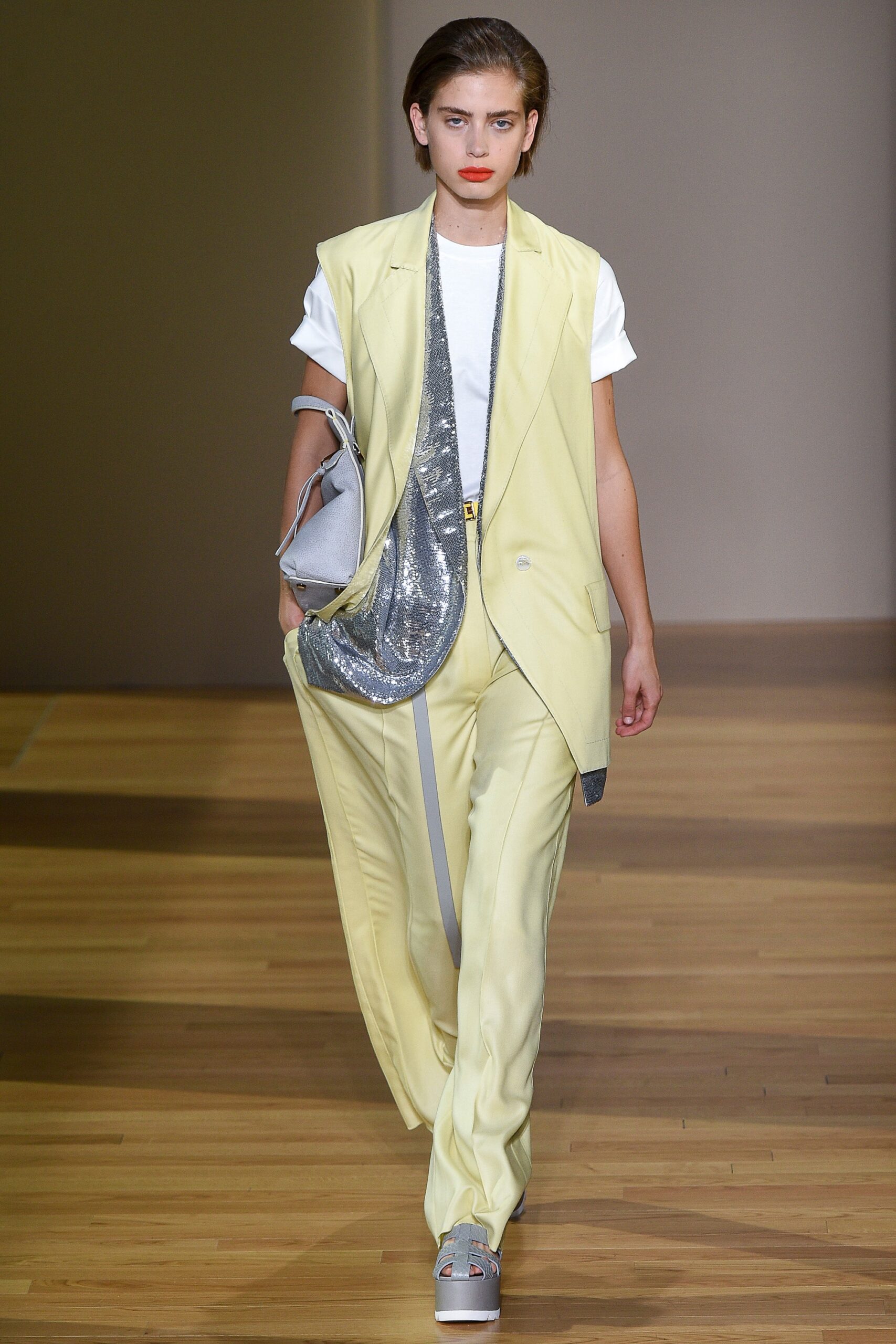 yellow tailored blazer with white top