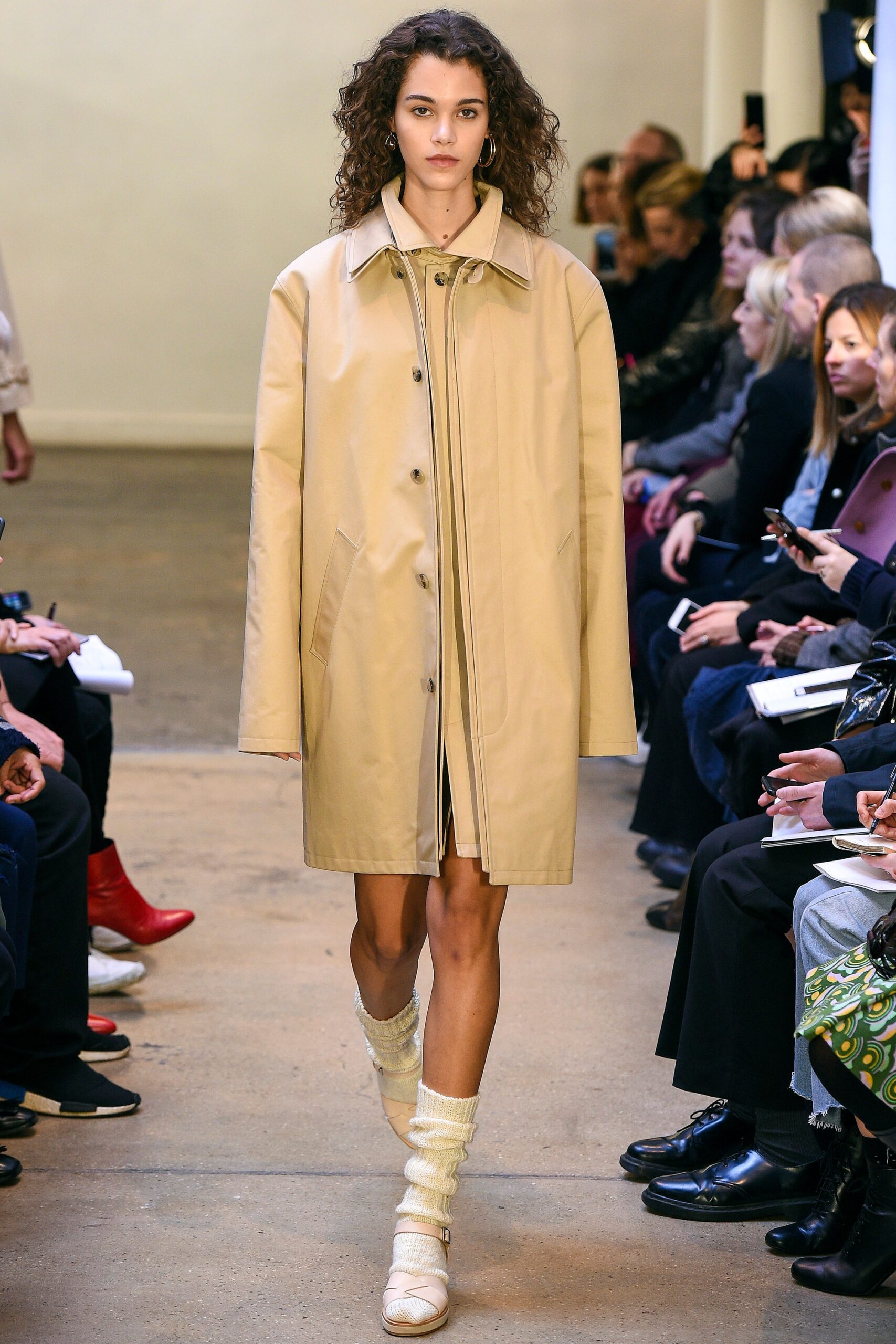 beige oversized vinyl coat